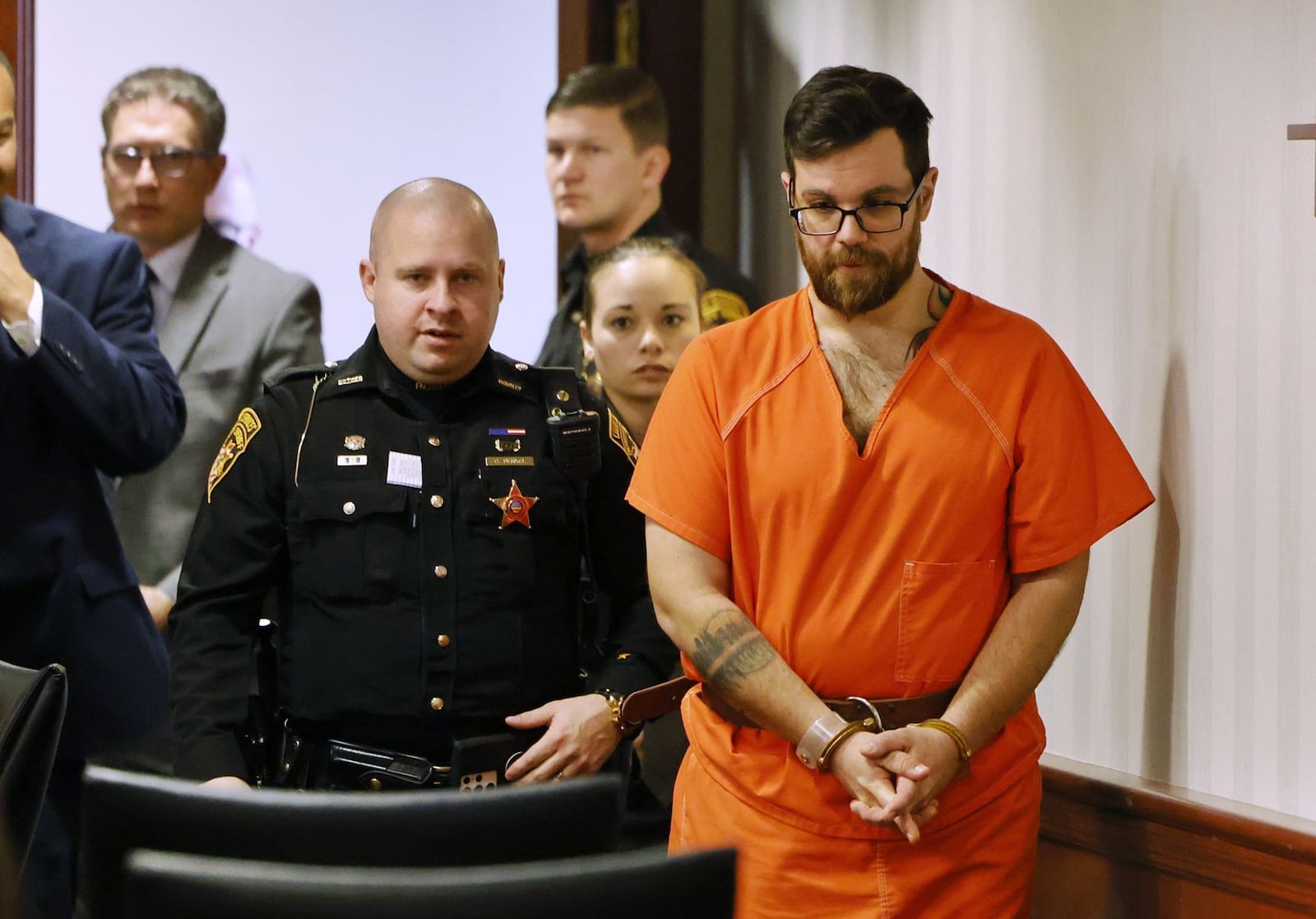 John Carter, charged with murder in the death case of Katelyn Markham, enters the Butler County Common Pleas Court on Monday, March 27, 2023. NICK GRAHAM/STAFF