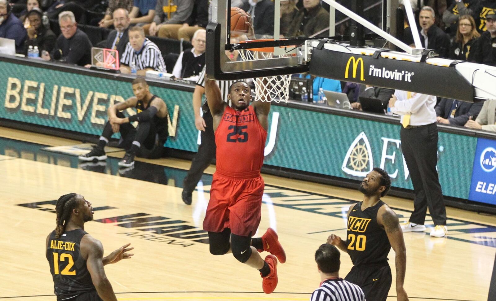 Dayton’s Kendall Pollard dunks against Virginia Commonwealth on Friday, Jan. 27, 2017, at the Siegel Center in Richmond, Va. David Jablonski/Staff