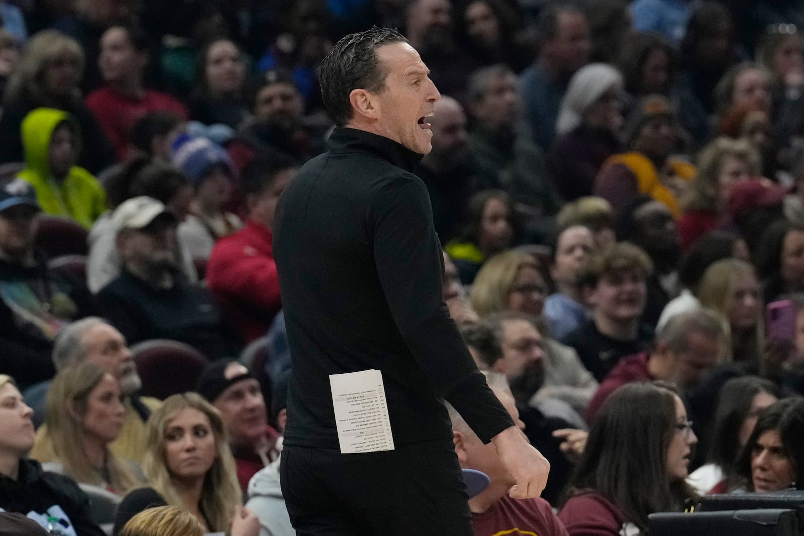 Cleveland Cavaliers head coach Kenny Atkinson shouts in the first half of an NBA basketball game against the Phoenix Suns, Monday, Jan. 20, 2025, in Cleveland. (AP Photo/Sue Ogrocki)