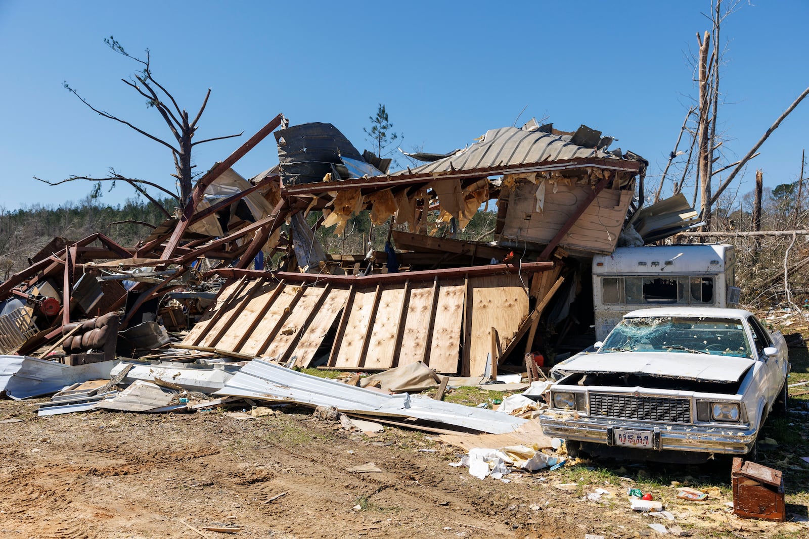 Well known community member Dunk Pickering perished at this warehouse site where he often hosted community members on Dallas County 63, Monday, March 17, 2025, in Plantersville, Ala, following deadly tornados that hit the area Saturday. (AP Photo/Vasha Hunt)