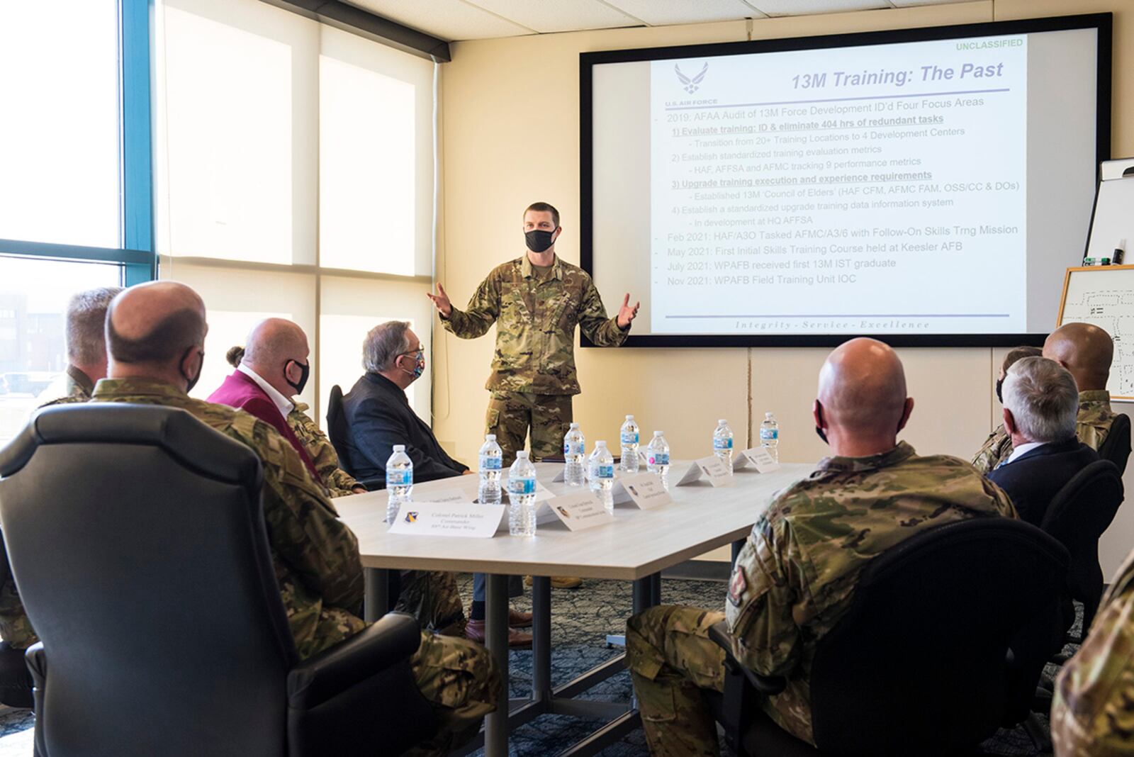 Maj. Hollis Troxel, 88th Operations Support Squadron director of operations, gives a presentation to base officials during the Follow-On Skills Training facility opening Nov. 3 at Wright-Patterson Air Force Base. U.S. AIR FORCE PHOTO/JAIMA FOGG