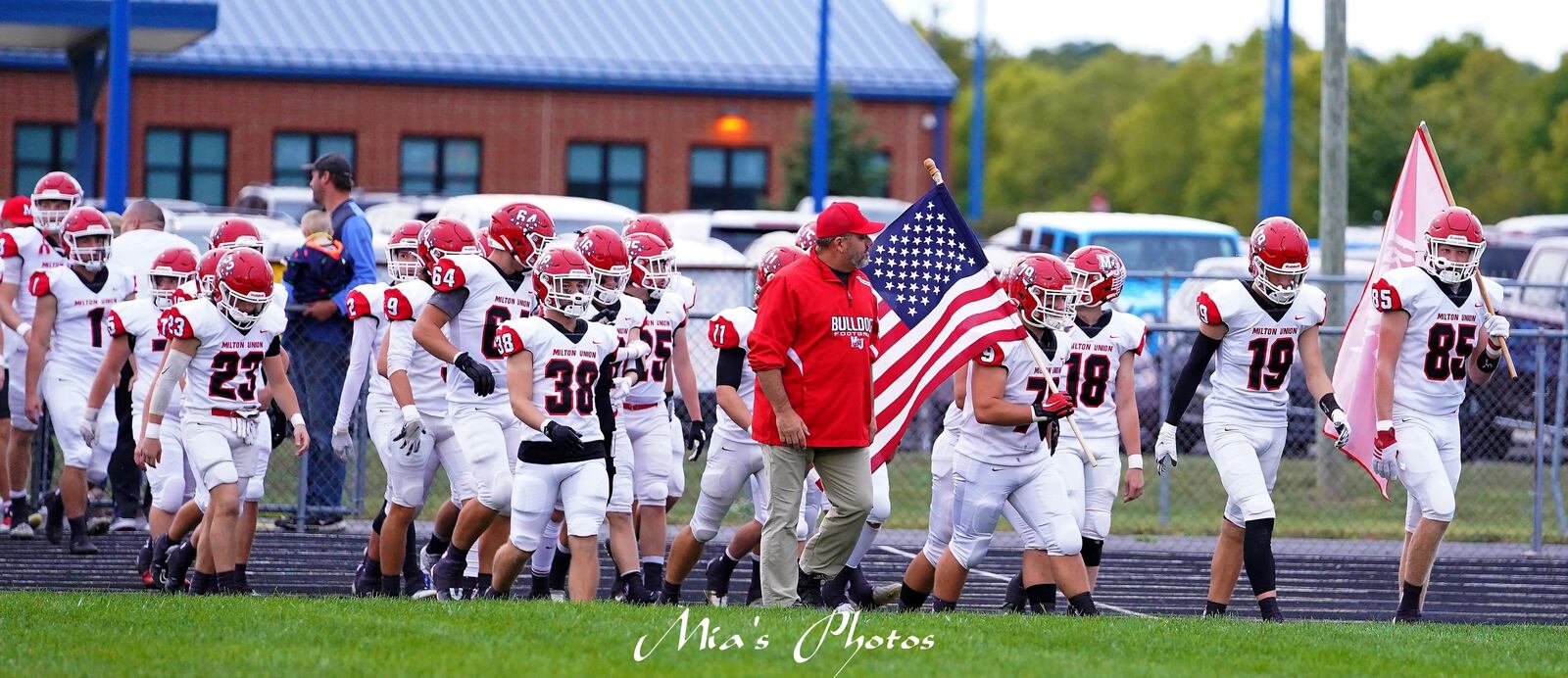 Bret Pearce, Milton Union High School football coach, and his team. Mia Richardson/Mia’s Photos