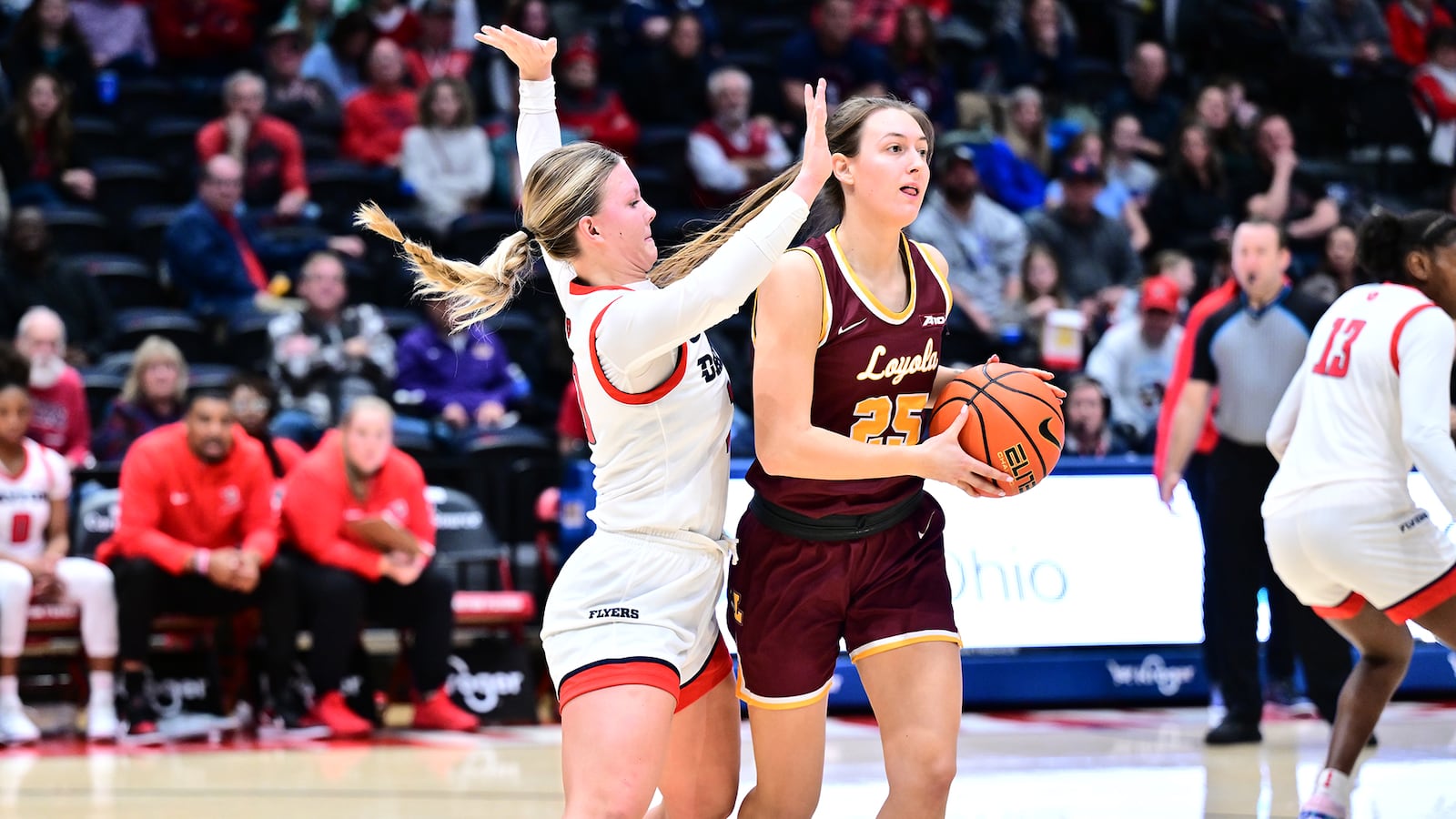 Dayton's Ivy Wolf pressures Loyola Chicago's Mallory Ramage during Saturday's game at UD Arena. Erik Schelkun/UD Athletics