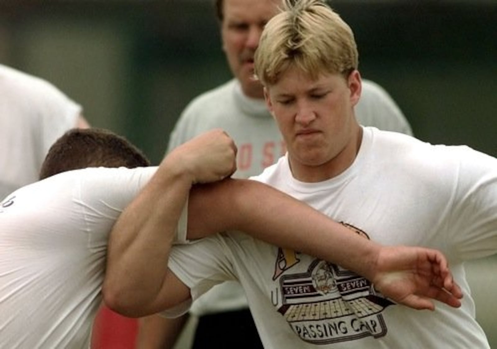 Nick Mangold, right, works out at Ohio State University during a football camp Thursday June 21, 2001 in Columbus.