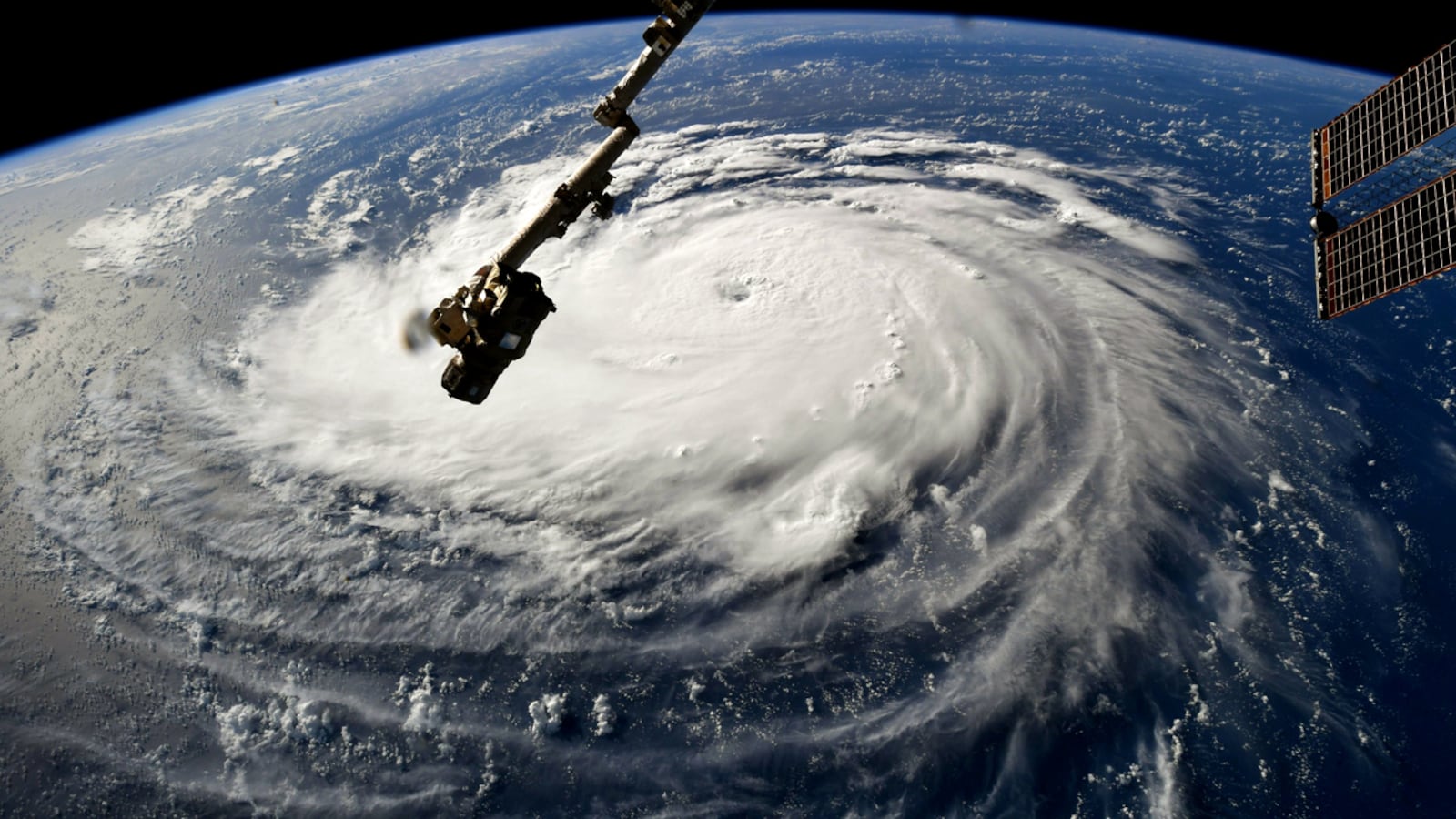 In this NASA handout image taken by Astronaut Ricky Arnold, Hurricane Florence gains strength in the Atlantic Ocean as it moves west, seen from the International Space Station on September 10, 2018.