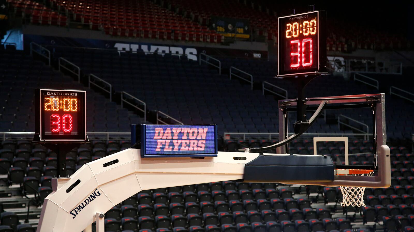 New baskets with two shot clocks and LED stanchion lights are part of phase on renovations at UD Arena.  TY GREENLEES / STAFF