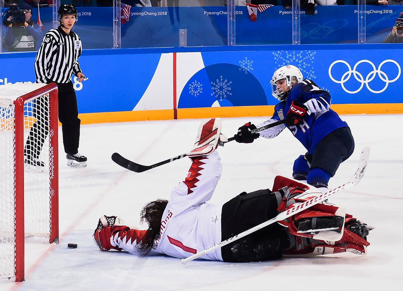 FILE - United States' Jocelyne Lamoureux (17) scores the game-winning goal in the shootout against Canada during the women's gold medal hockey game at the 2018 Winter Olympics in Gangneung, South Korea, Thursday, Feb. 22, 2018. (Nathan Denette/The Canadian Press via AP, File)