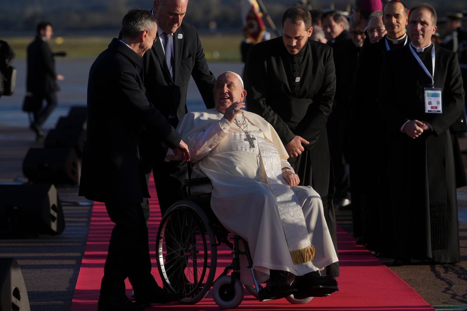 Pope Francis arrives at Ajaccio International Airport on the occasion of his one-day visit in the French island of Corsica, Sunday, Dec. 15, 2024. (AP Photo/Alessandra Tarantino)