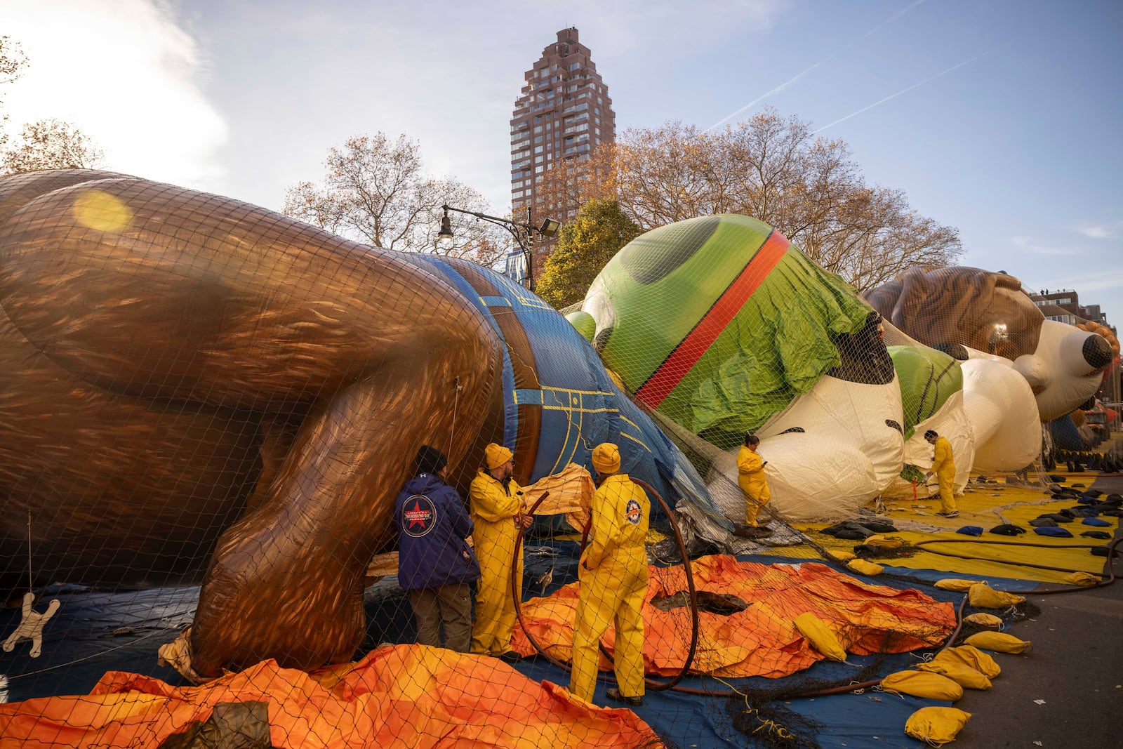 People inflate floats in preparation for the Macy's Thanksgiving Day Parade, Wednesday, Nov. 27, 2024, in New York. (AP Photo/Yuki Iwamura)