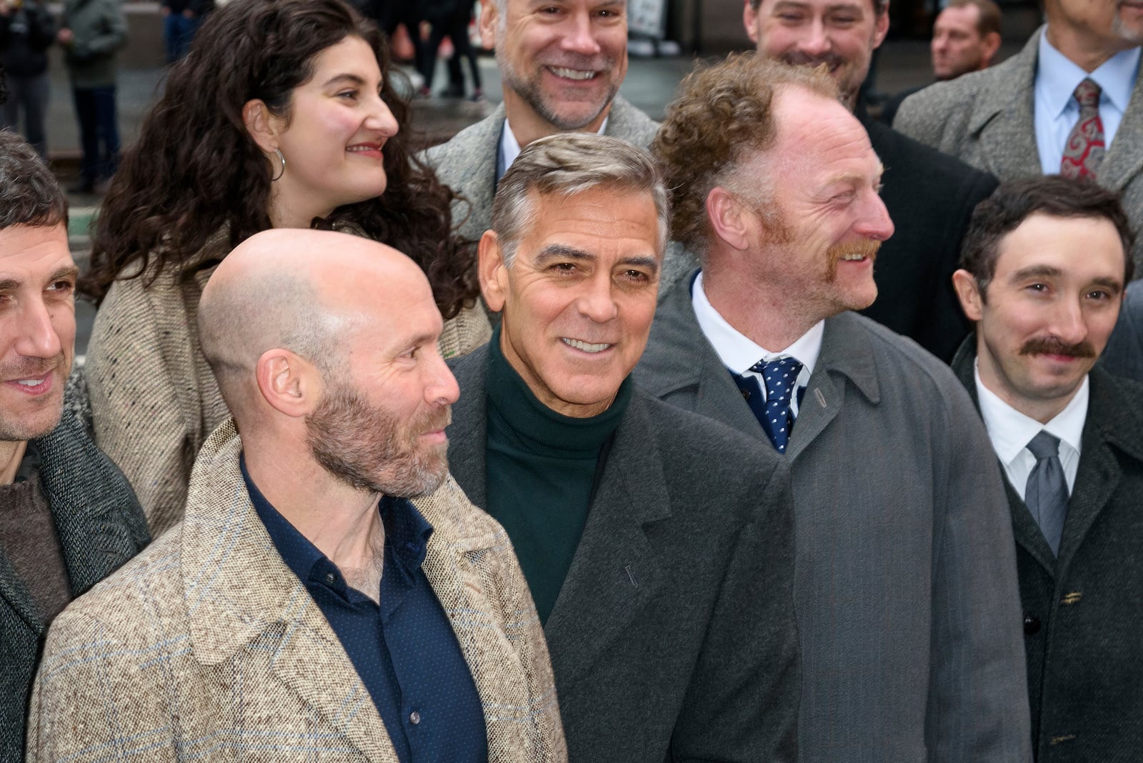 FILE - George Clooney, center, appears at the "Good Night, and Good Luck" Broadway cast announcement at the Winter Garden Theatre on Feb. 6, 2025, in New York. (Photo by Christopher Smith/Invision/AP, File)