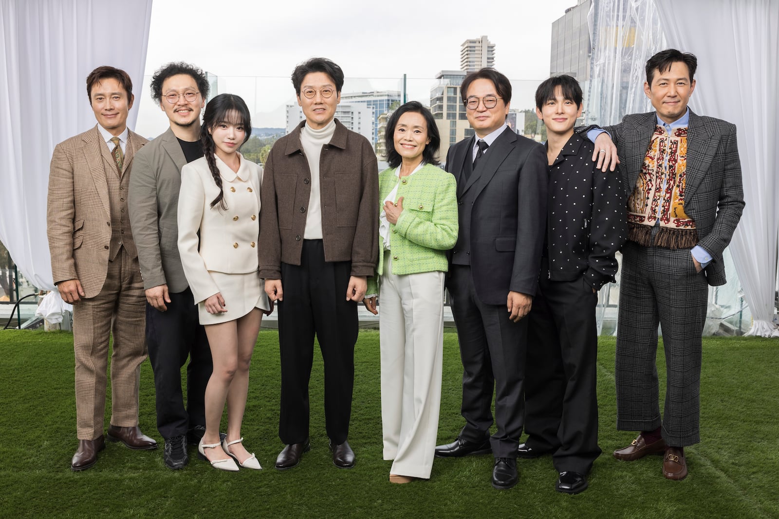 Lee Byung-hun, from left, Yang Dong-geun, Jo Yu-ri, Hwang Dong-hyuk, Kang Ae-sim, Lee Seo-hwan, Im Si-wan and Lee Jung-jae pose for a portrait to promote the second season of "Squid Game" on Wednesday, Dec. 11, 2024, in Los Angeles. (Photo by Willy Sanjuan/Invision/AP)