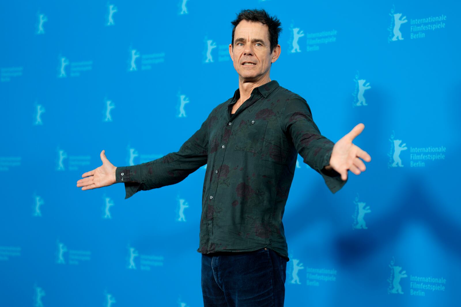 Director Tom Tykwer poses for photographer at the photo call for the film 'Das Licht' at the International Film Festival, Berlinale, in Berlin, Thursday, Feb. 13, 2025. (AP Photo/Markus Schreiber)