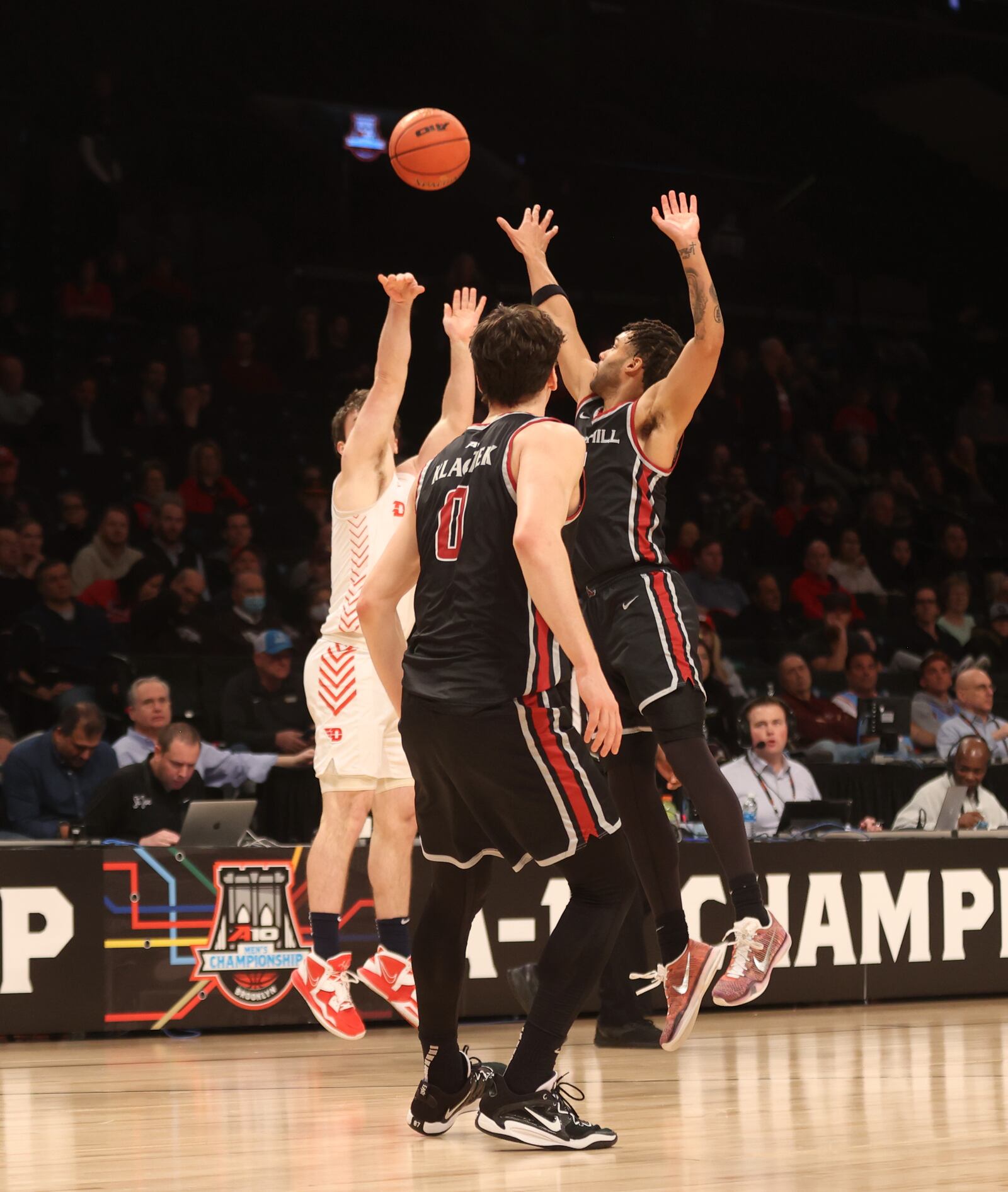 Dayton's Brady Uhl makes a 3-pointer against Saint Joseph’s in the quarterfinals of the Atlantic 10 Conference tournament on Thursday, March 9, 2023, at the Barclays Center in Brooklyn, N.Y. David Jablonski/Staff