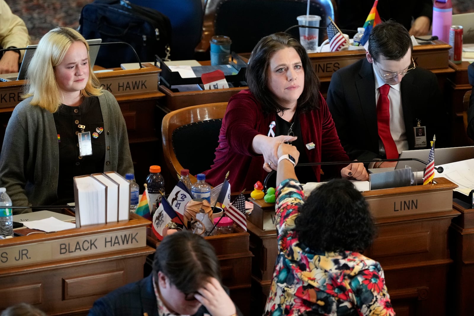 Rep. Aime Wichtendahl, D-Hiawatha, reacts after speaking during debate on the gender identity bill, Thursday, Feb. 27, 2025, at the Statehouse in Des Moines, Iowa. (AP Photo/Charlie Neibergall)