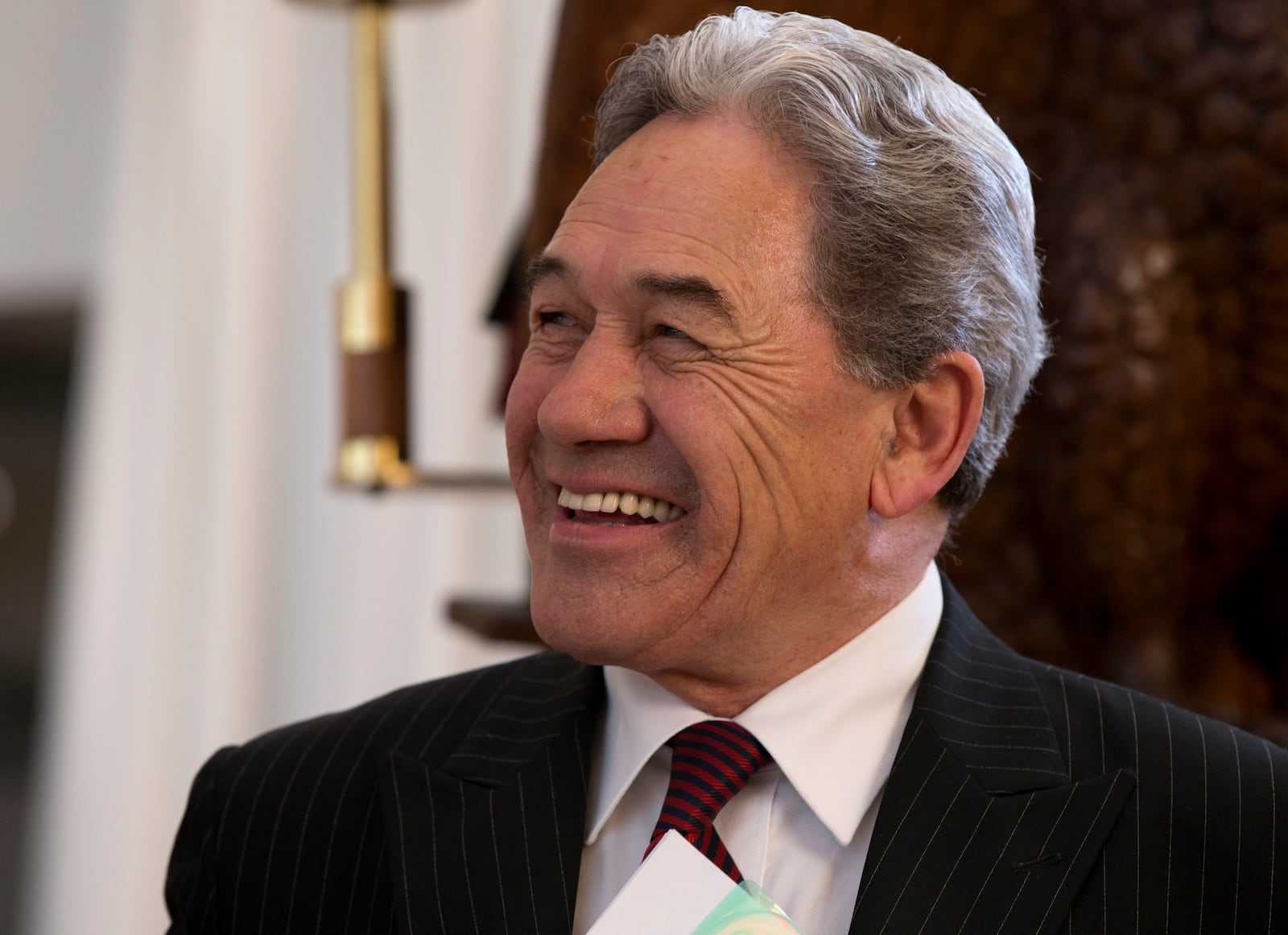 FILE - New Zealand First leader Winston Peters smiles during an election event in Christchurch, New Zealand, Aug. 16, 2017. (AP Photo/Mark Baker, File)