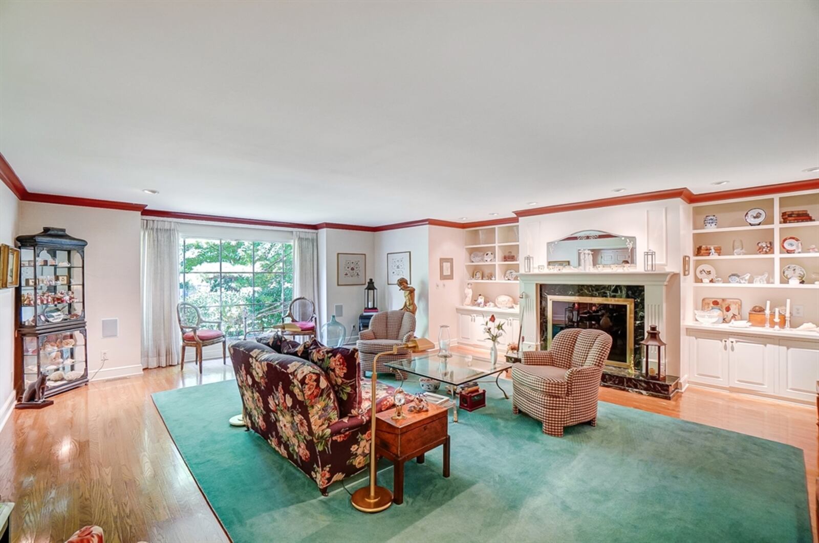 The spacious living room features a fireplace. CONTRIBUTED