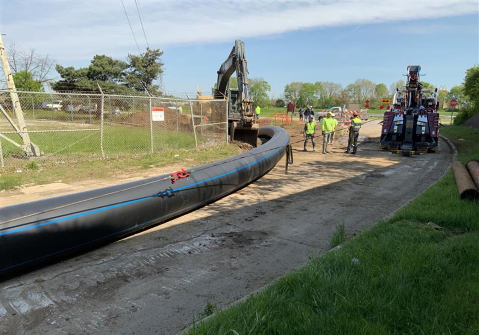 A city of Dayton crew replacing a water main pipe under the Great Miami River at the southern section of the city Thursday afternoon./ CONTRIBUTED