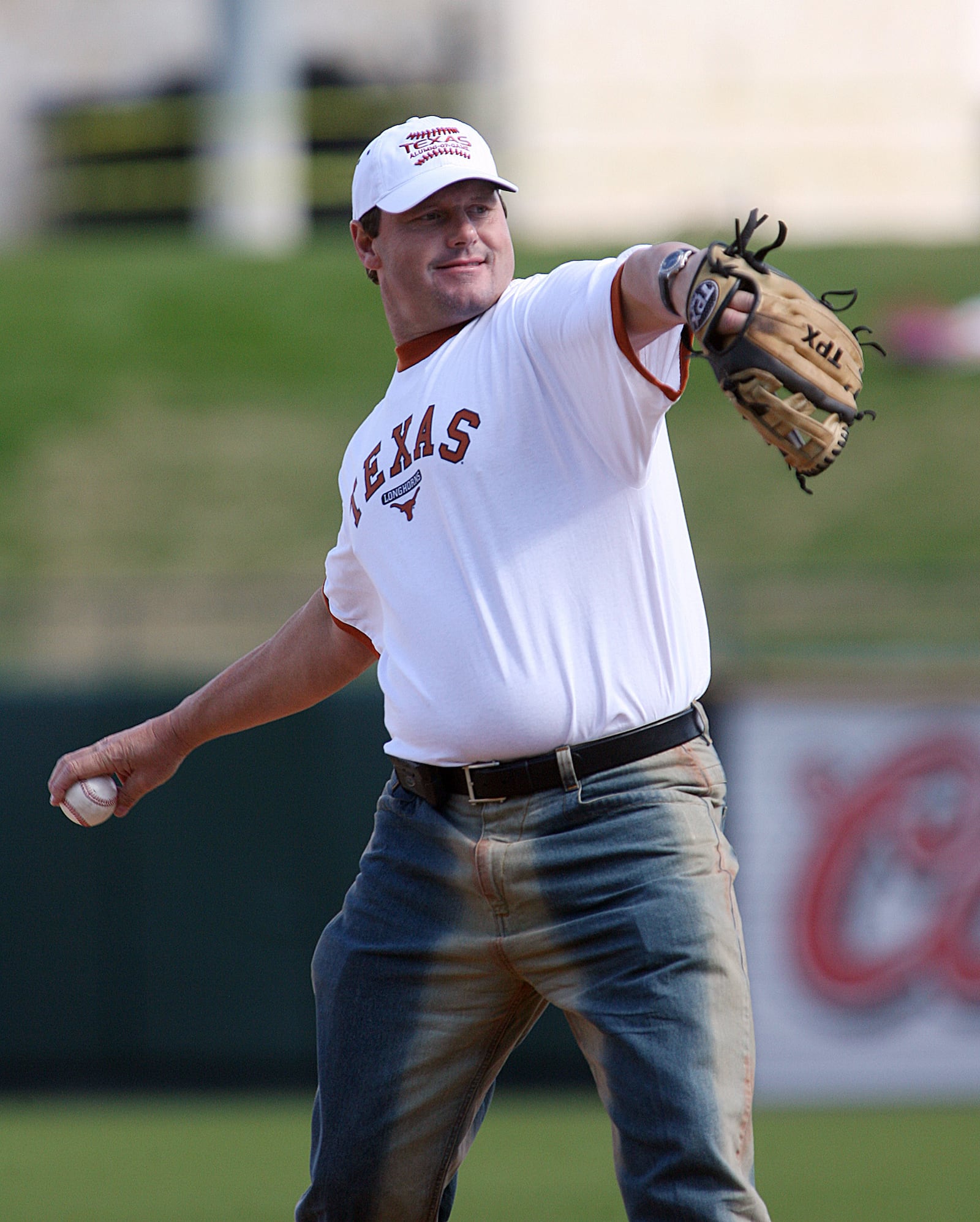 ORG XMIT: TXDC10 Deborah Cannon/AMERICAN-STATESMAN Roger Clemens throws out the first pitch during the Texas alumni game at the Dell Diamond on Saturday, Jan. 27, 2007.