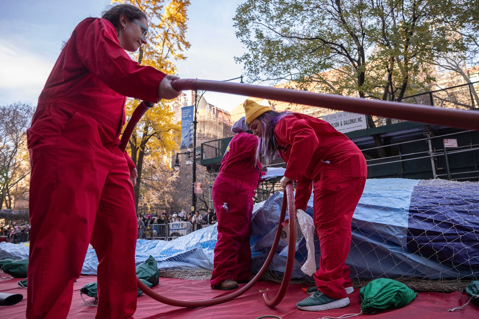 People inflate floats in preparation for the Macy's Thanksgiving Day Parade, Wednesday, Nov. 27, 2024, in New York. (AP Photo/Yuki Iwamura)