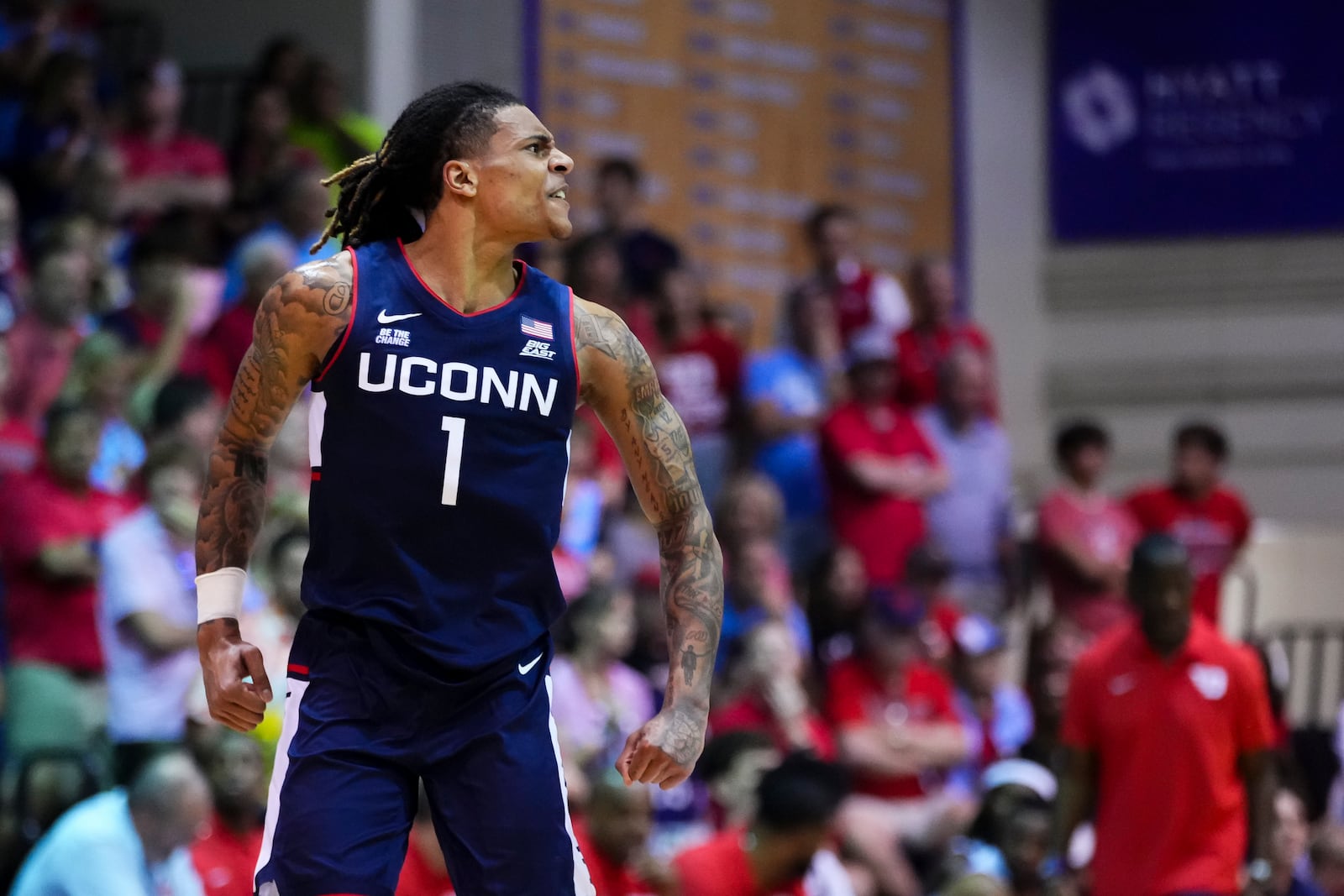 UConn guard Solo Ball (1) reacts during the first half of an NCAA college basketball game against Dayton at the Maui Invitational Wednesday, Nov. 27, 2024, in Lahaina, Hawaii. (AP Photo/Lindsey Wasson)