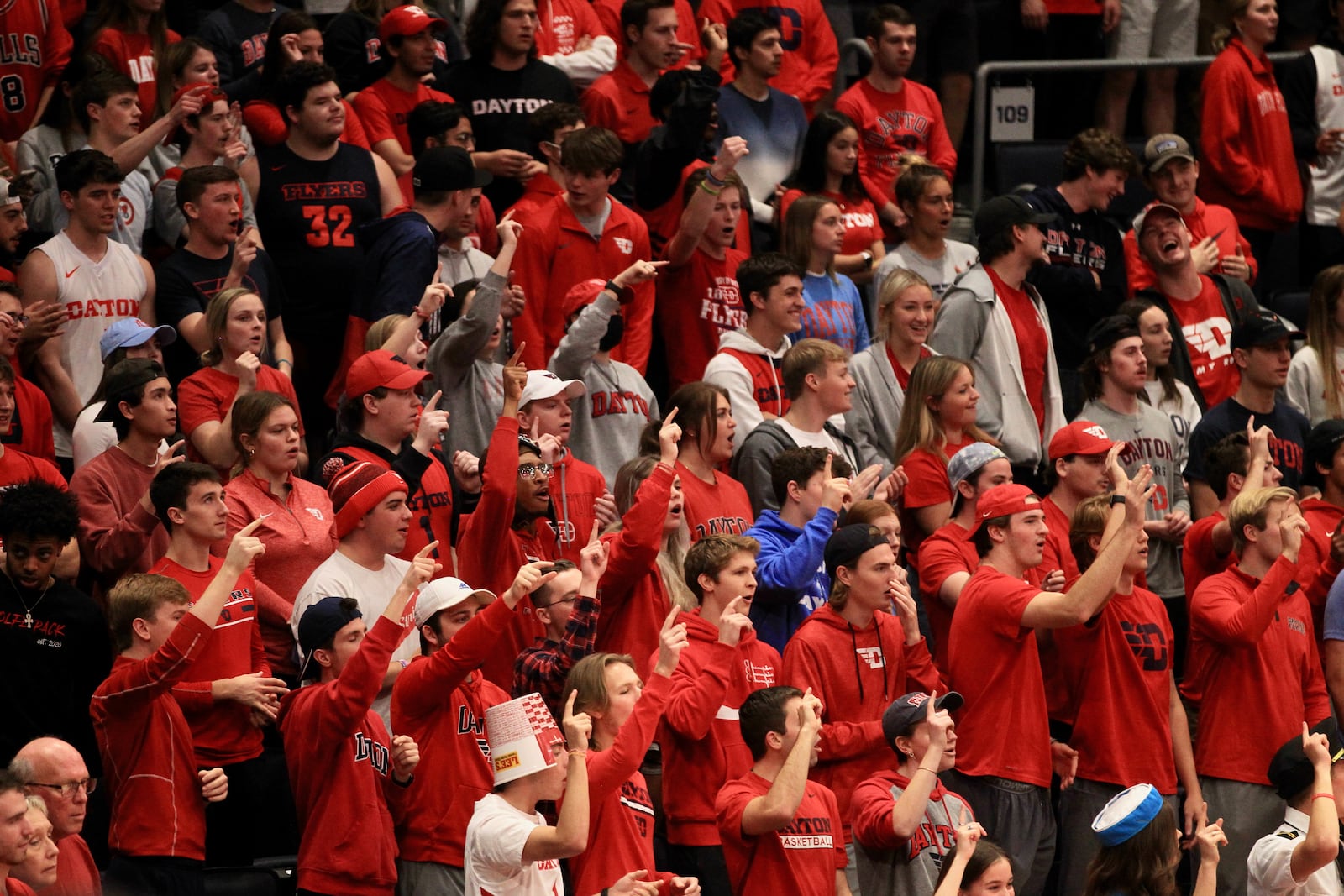 Dayton fans in the student section cheer before a game against Illinois-Chicago on Tuesday, Nov. 9, 2021, at UD Arena. David Jablonski/Staff