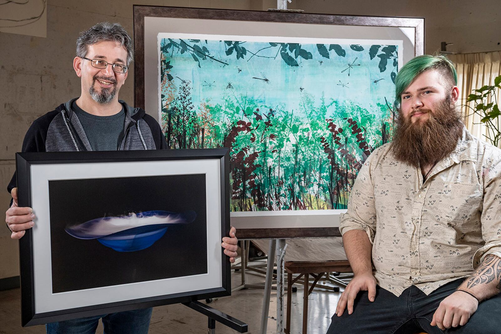 Patrons can purchase “Mist Bowl” by Eric Denlinger, left, and “A Clearing Ahead” by William Worley to help support Wright State fine and performing arts students through ArtsUNgala.