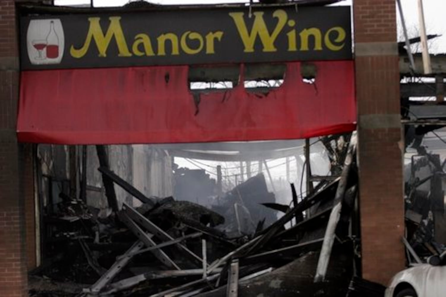 Page Manor shopping center damaged by fire