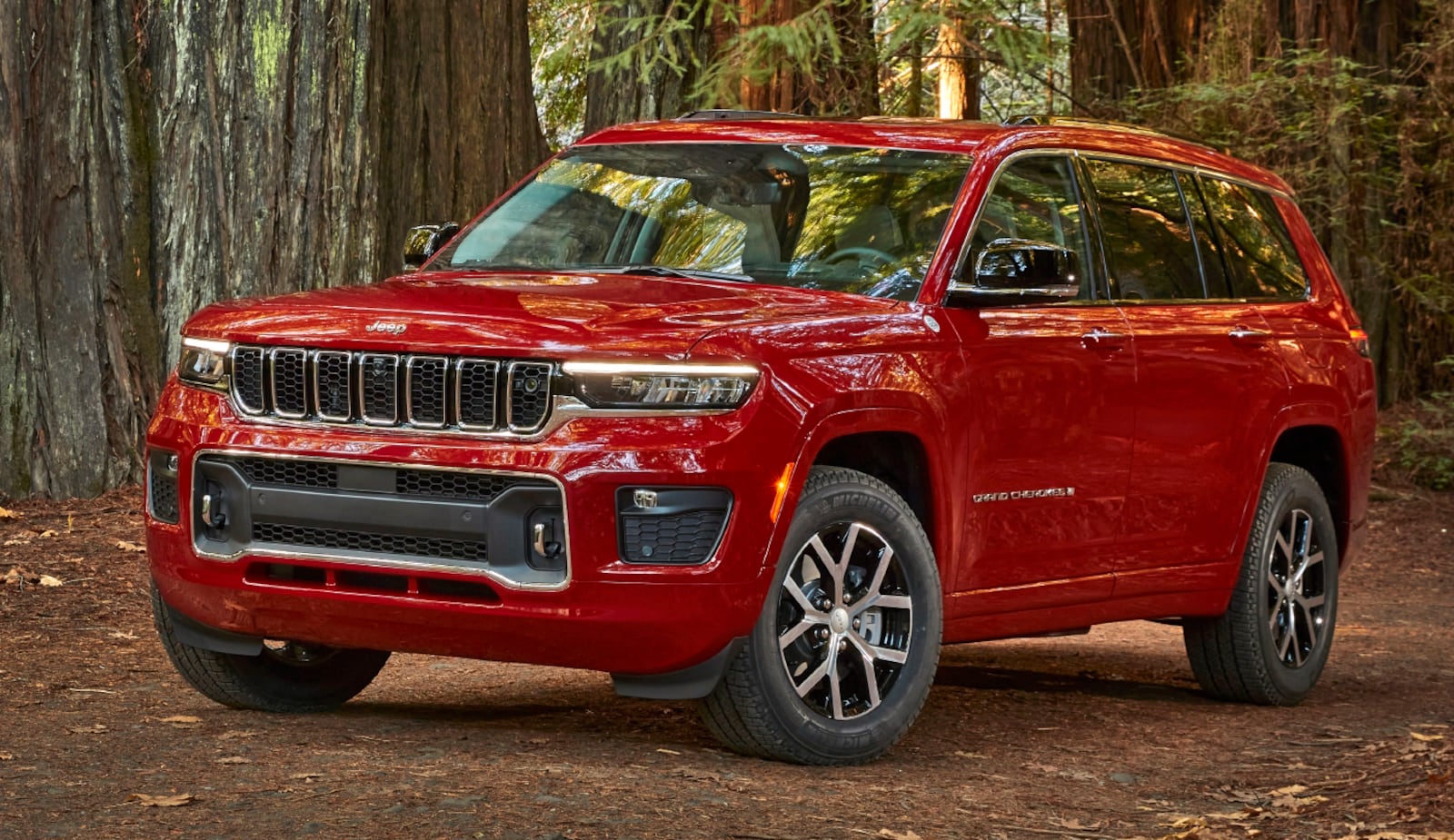 This photo provided by Fiat Chrysler Automobiles shows the 2021 Jeep Grand Cherokee L, a midsize SUV that will feature the new Uconnect 5 infotainment system. (FCA US via AP)