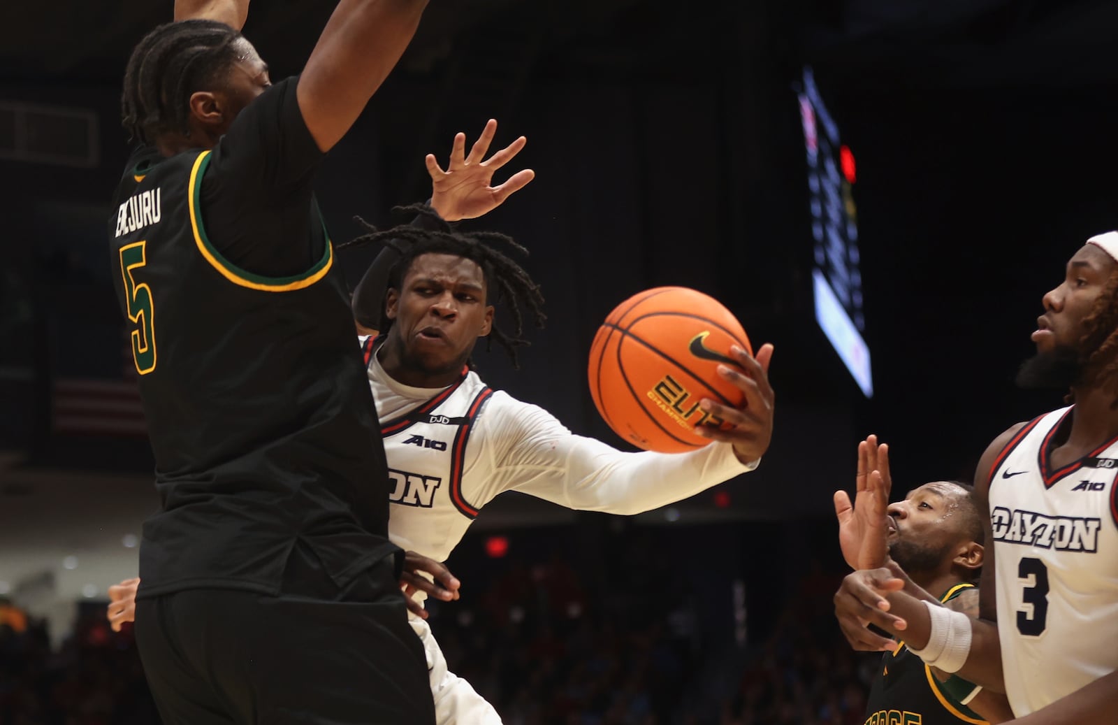 Dayton's Malachi Smith makes a pass against George Mason on Wednesday, Jan. 15, 2025, at UD Arena. David Jablonski/Staff