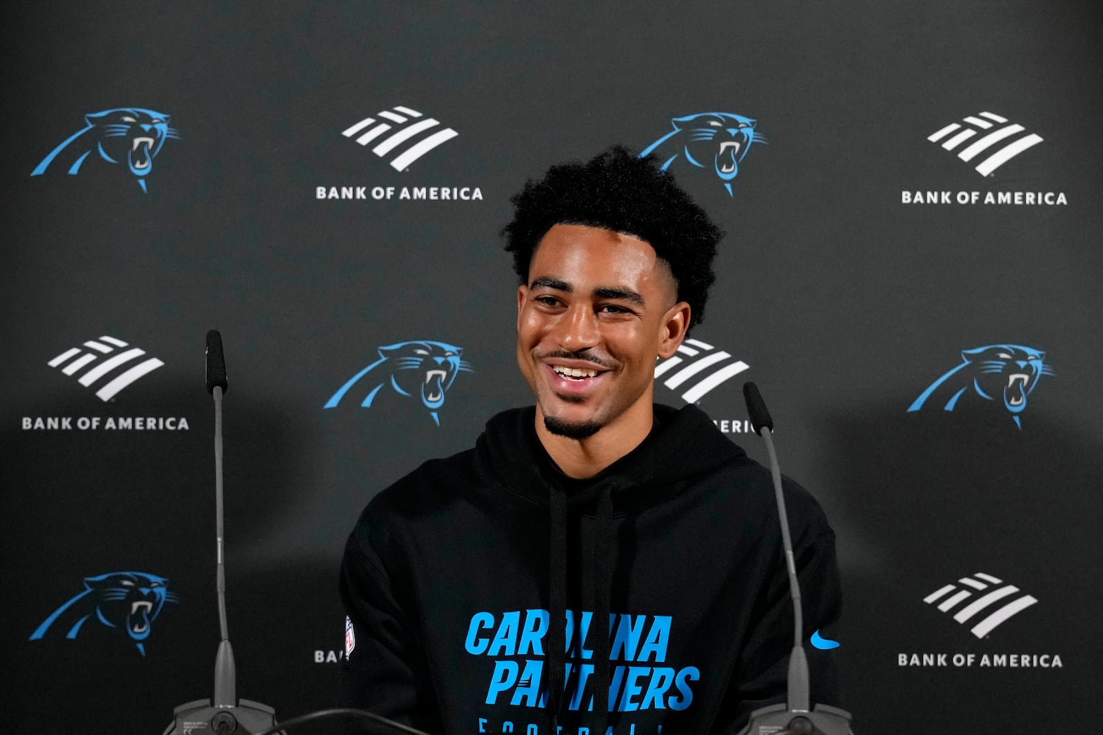 Carolina Panthers quarterback Bryce Young (9) attends a news conference after a practice session in Munich, Germany, Friday, Nov. 8, 2024. The Carolina Panthers are set to play the New York Giants in an NFL game at the Allianz Arena in Munich on Sunday Nov. 10. (AP Photo/Matthias Schrader)