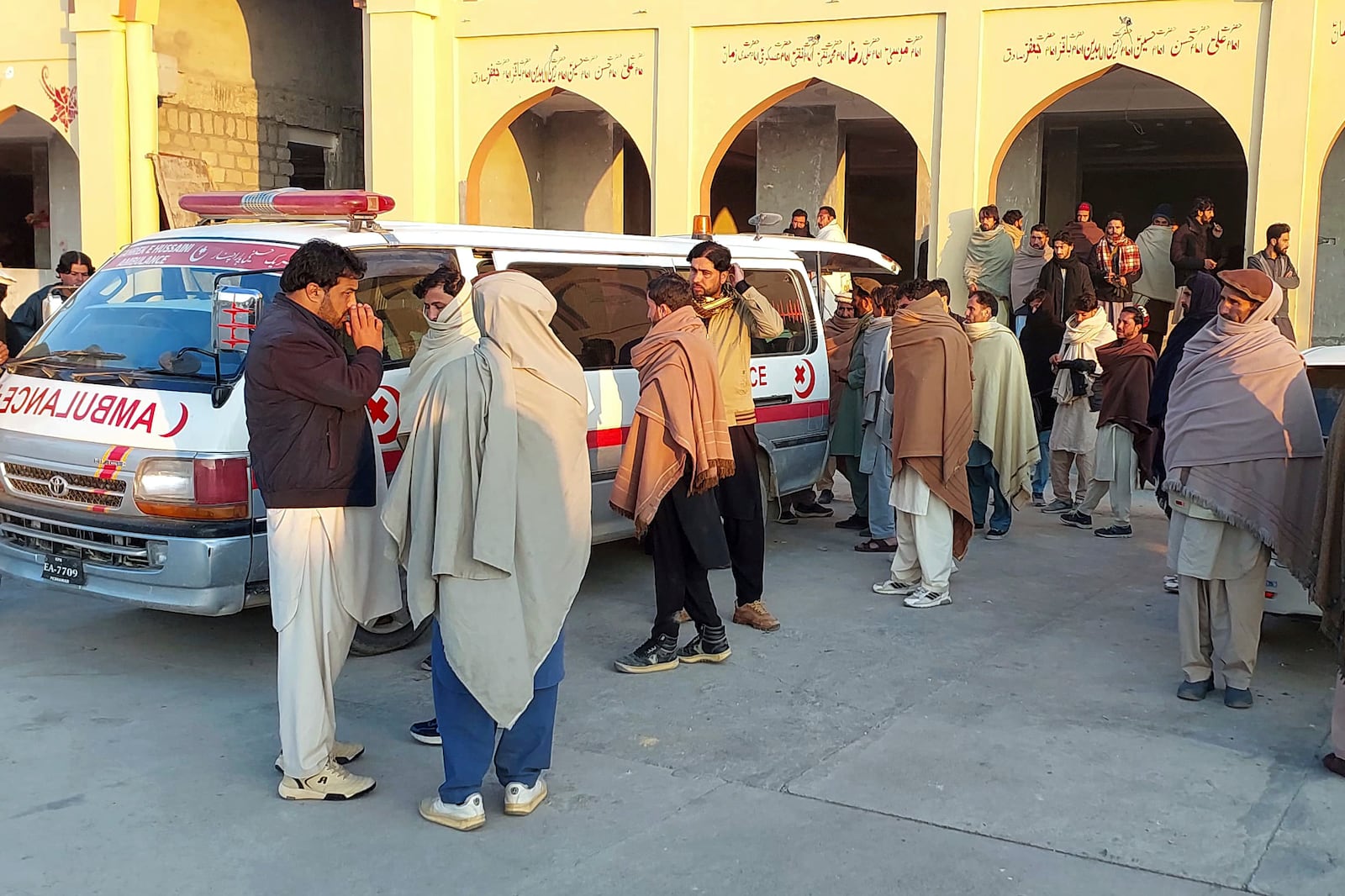 Relatives gather to collect the body of a person who was killed when gunmen fired on vehicles carrying Shiite Muslims Thursday, at a hospital in Parachinar, main town of Kurram district of Pakistan's northwestern Khyber Pakhtunkhwa province, Friday, Nov. 22, 2024. (AP Photo/Hussain Ali)