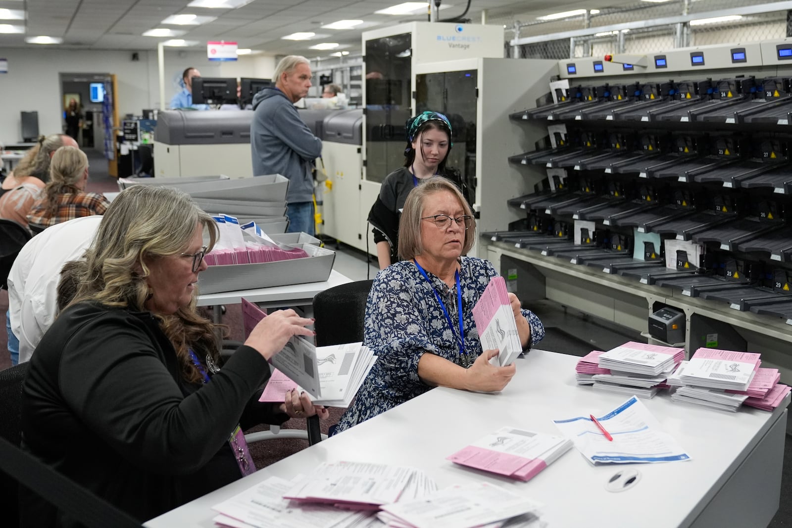 FILE - Election workers count ballots at the Washoe County Registrar of Voters Office, Nov. 5, 2024, in Reno, Nev. (AP Photo/Godofredo A. Vásquez, File)