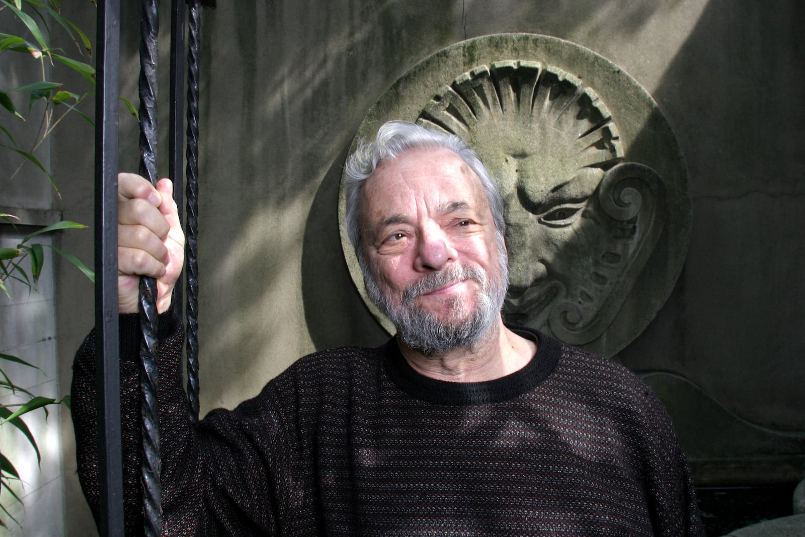 FILE — Stephen Sondheim, at home in New York in August 2003. Sondheim, one of Broadway history’s songwriting titans, whose music and lyrics raised and reset the artistic standard for the American stage musical, died at his home in Roxbury early on Friday, Nov. 26, 2021. He was 91. (Chester Higgins Jr./The New York Times)