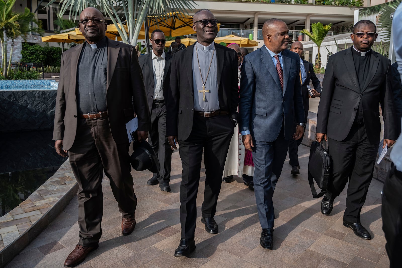 Members of the National Episcopal Conference of Congo and the Church of Christ arrived for a meeting with the Leader of the political military coalition in Goma, Democratic Republic of the Congo, Wednesday, Feb. 12, 2025. (AP Photo/Moses Sawasawa)