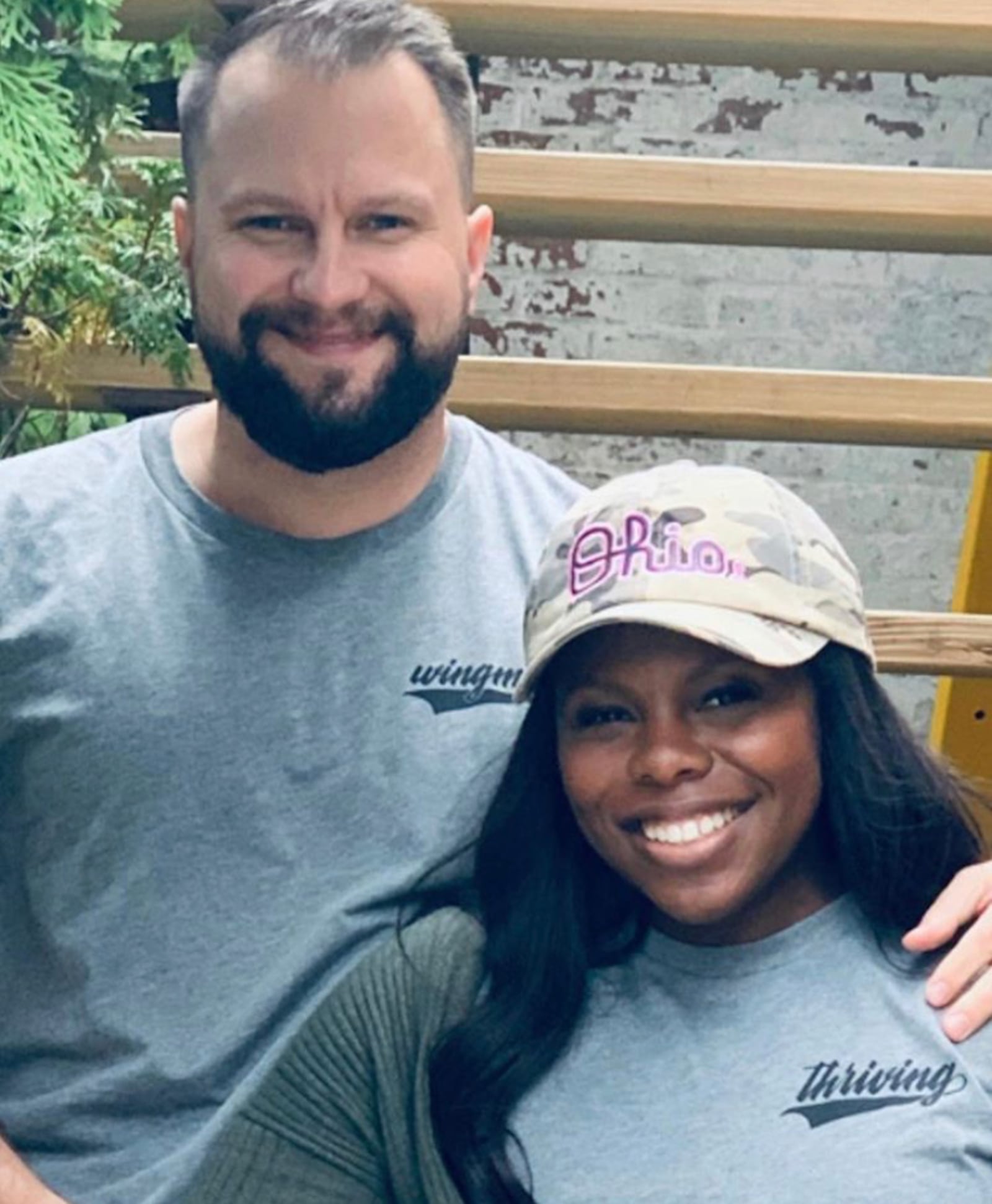 Sugarcreek Twp. resident Nichole Smith, the programming director of Pink Ribbon Girls, is Dayton of the Week.  She is pictured with her husband, Adam.