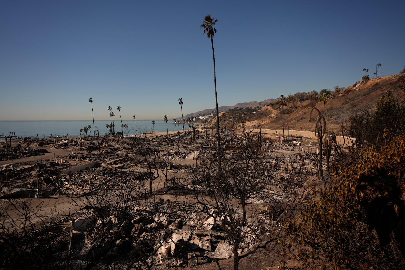 A mobile home park destroyed by the Palisades Fire in Palisades, Calif. is seen, Wednesday, Jan. 15, 2025. (AP Photo/Jae C. Hong)