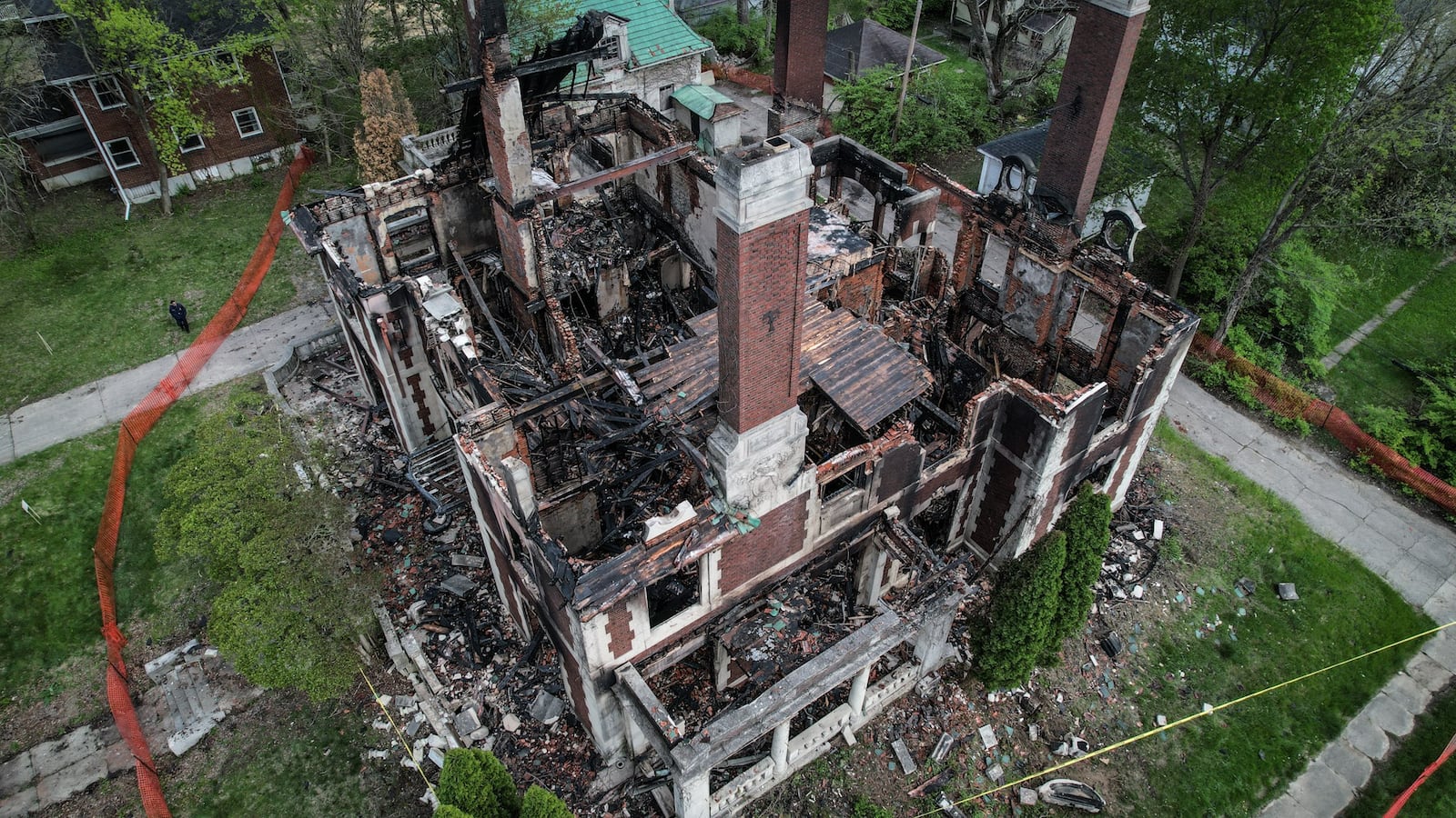 The Louis Traxler Mansion, a famed West Dayton property that is part of the National Register of Historic Places, was badly damaged by fire early Sunday morning April 23, 2023, just days before it was scheduled to be auctioned. JIM NOELKER/STAFF