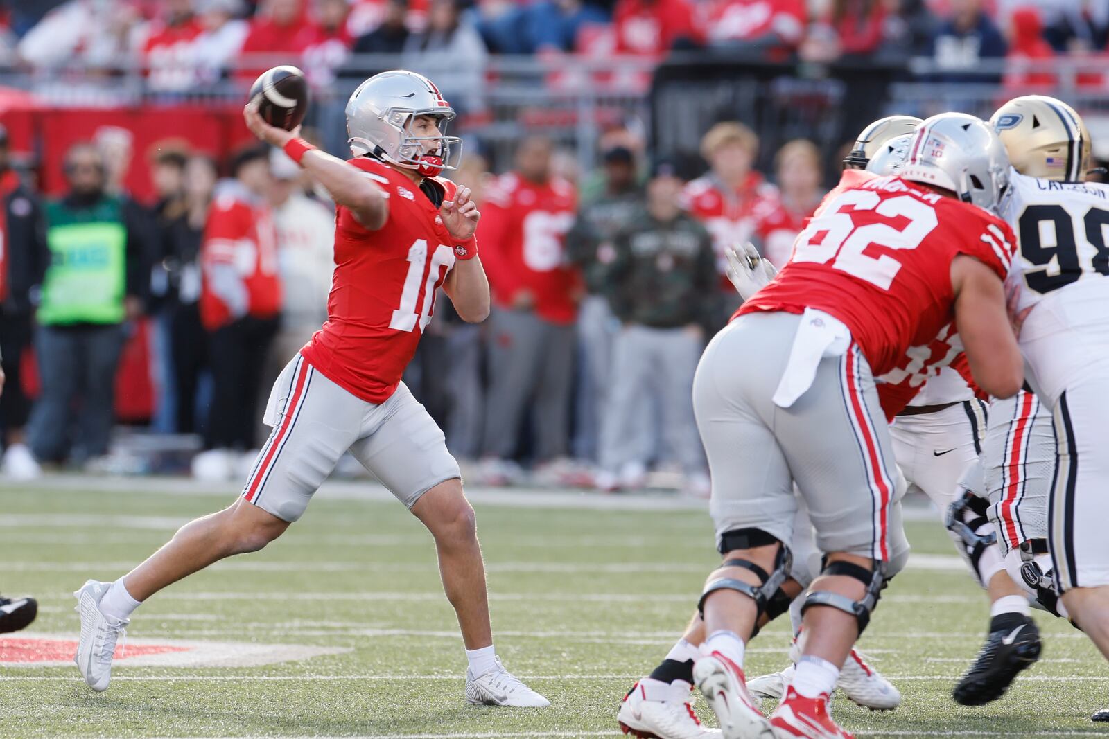 Ohio State quarterback Julian Sayin throws a pass against Purdue during the second half of an NCAA college football game Saturday, Nov. 9, 2024, in Columbus, Ohio. (AP Photo/Jay LaPrete)