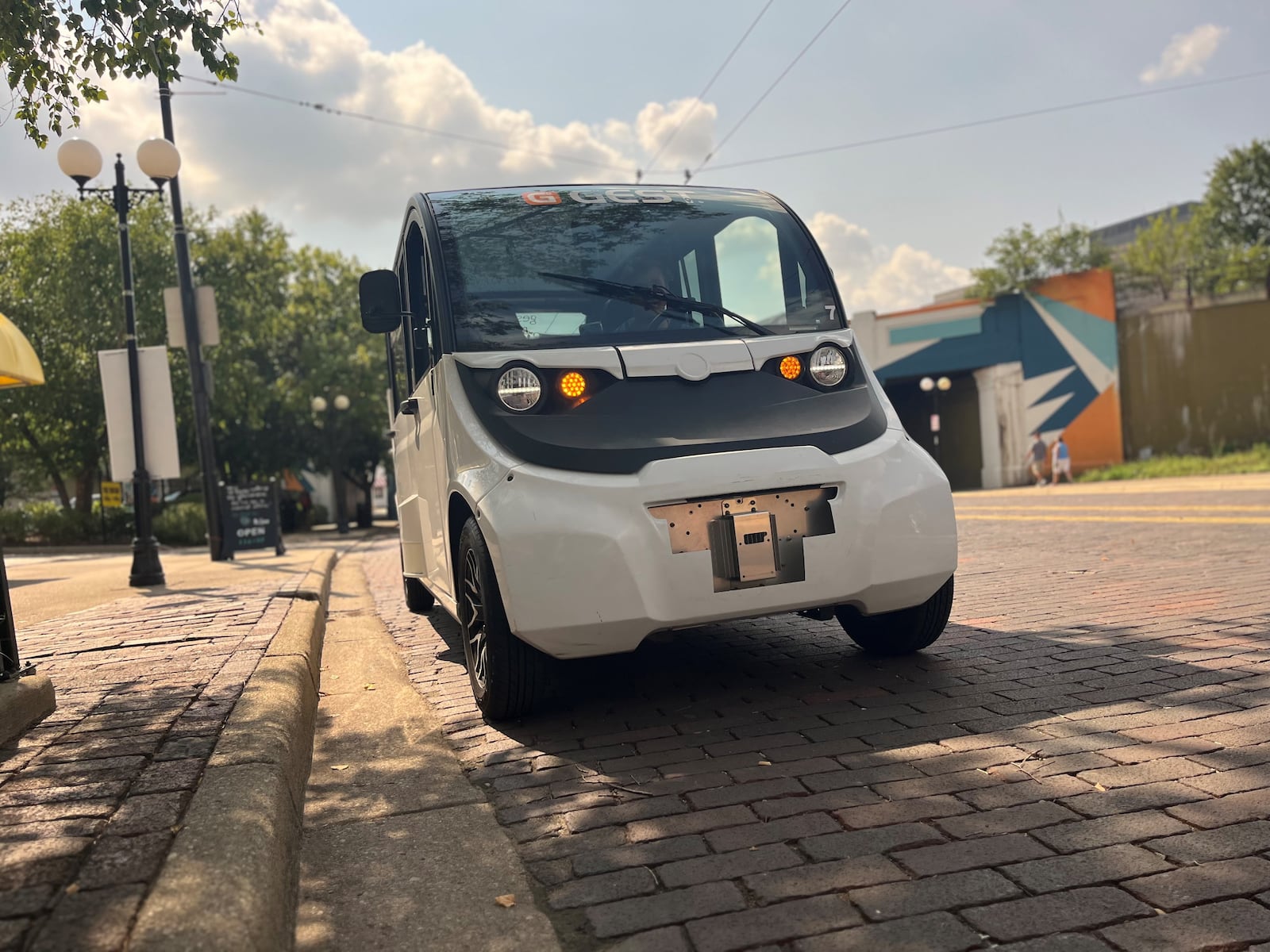 GEST Dayton, a new electric cart ride service, offered free rides in downtown Dayton during Art in the City on Saturday, Aug. 3, 2024. CORNELIUS FROLIK / STAFF