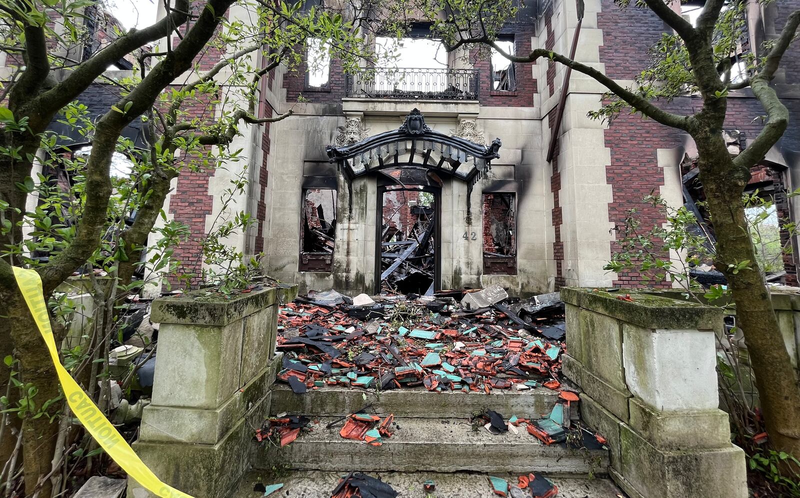 The Traxler Mansion at the corner of Broadway and Yale in West Dayton was badly damaged by fire on Sunday, April 23, 2023. JEREMY P. KELLEY / STAFF