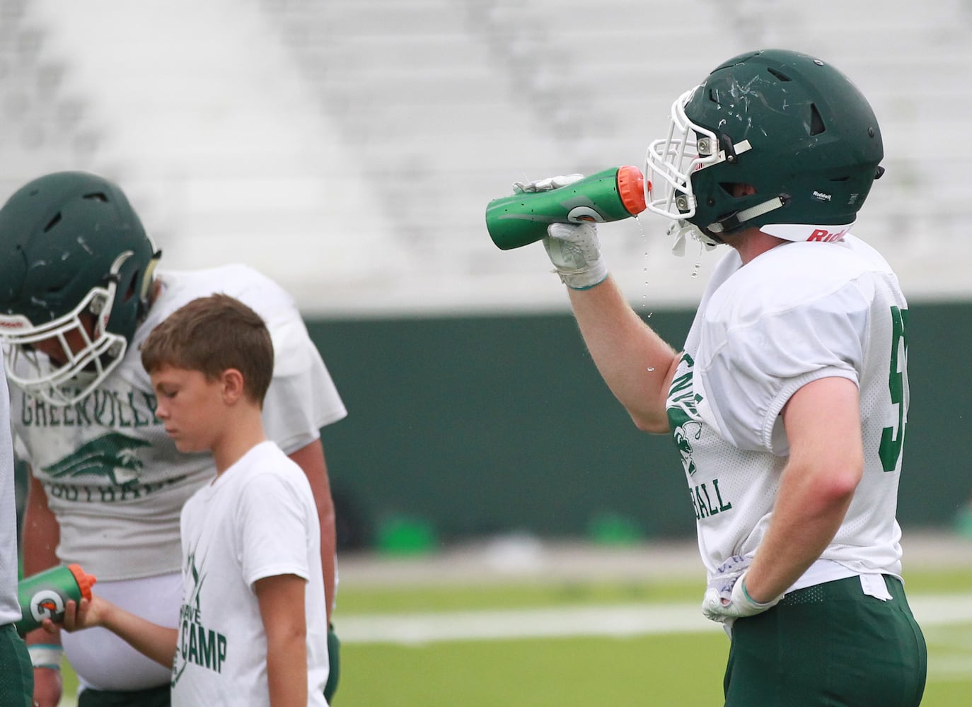 PHOTOS: Celina at Greenville, preseason football scrimmage