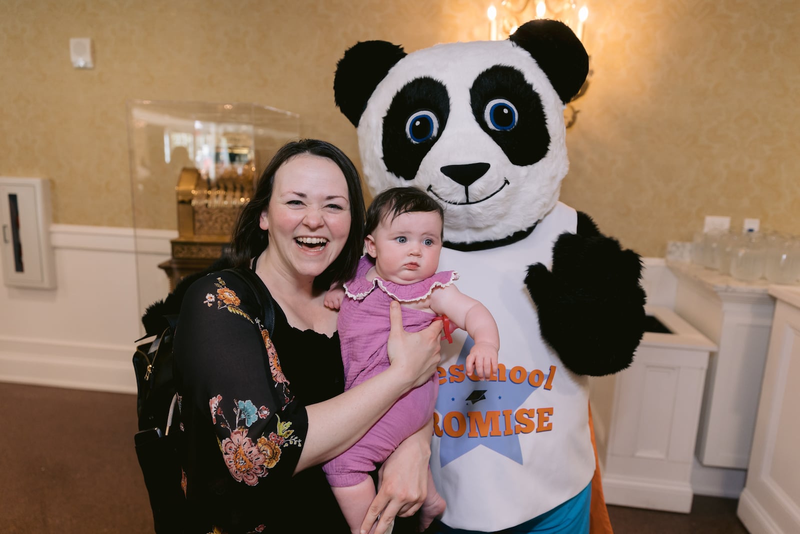 Attendees pose with the Preschool Promise panda during the second annual awards banquet from Preschool Promise. Courtesy of Preschool Promise.