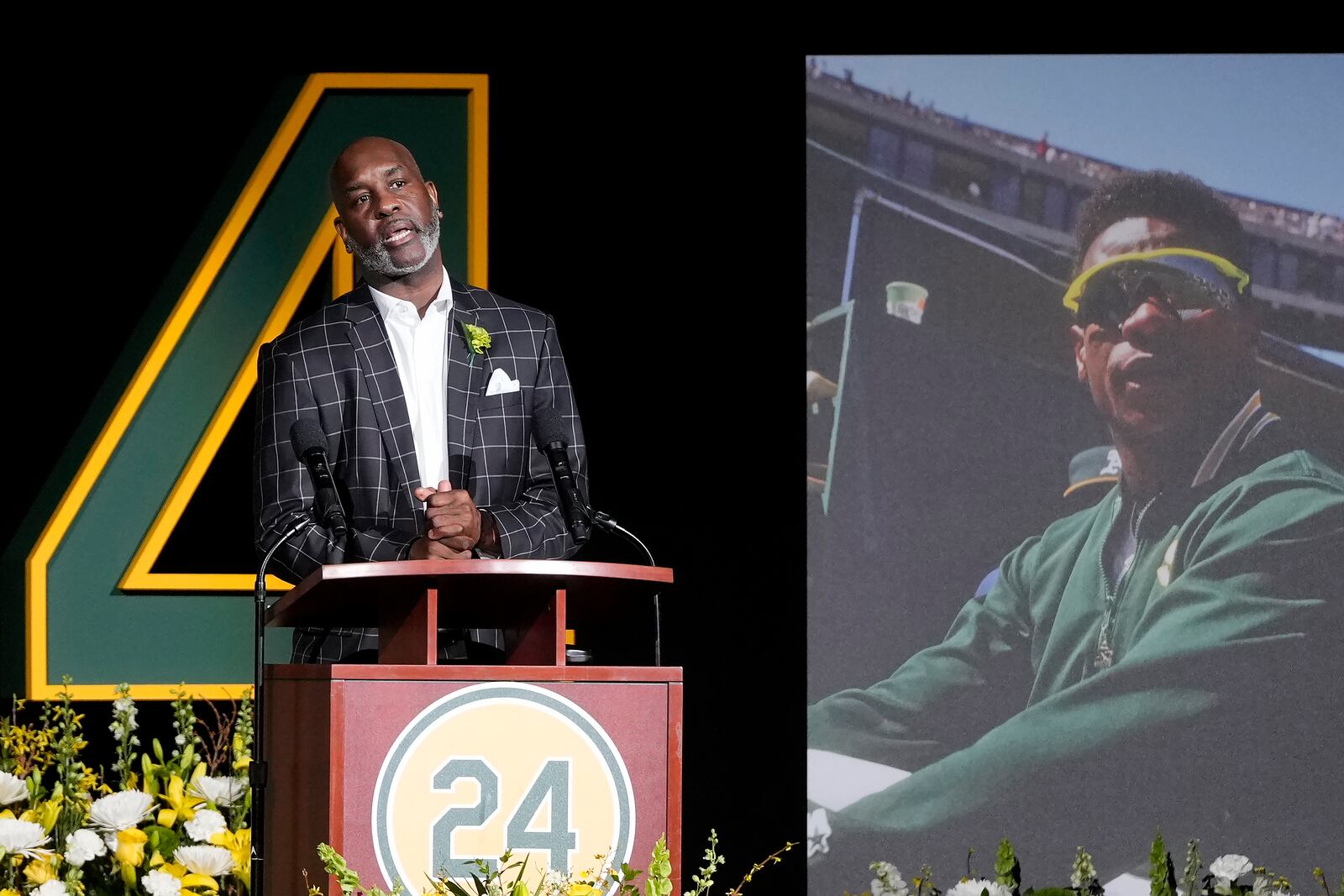 Former NBA basketball player Gary Payton speaks during a celebration of life for former Oakland Athletics baseball player Rickey Henderson in Oakland, Calif., Saturday, Feb. 1, 2025. (AP Photo/Jeff Chiu)