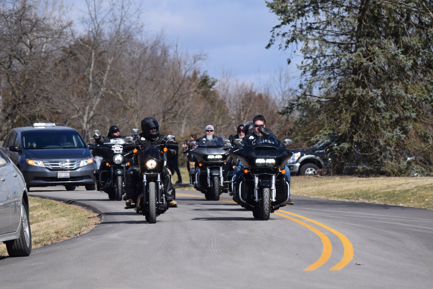 PHOTOS: Thousands of Outlaws attend motorcycle gang leaders funeral at Montgomery County Fairgrounds.