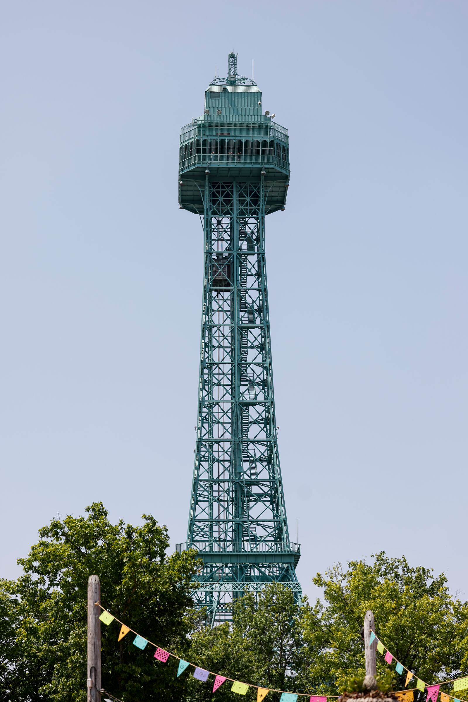 Kings Island visitors get a view from the top of the Eiffel Tower Friday, June 9, 2023 in Mason. NICK GRAHAM/STAFF