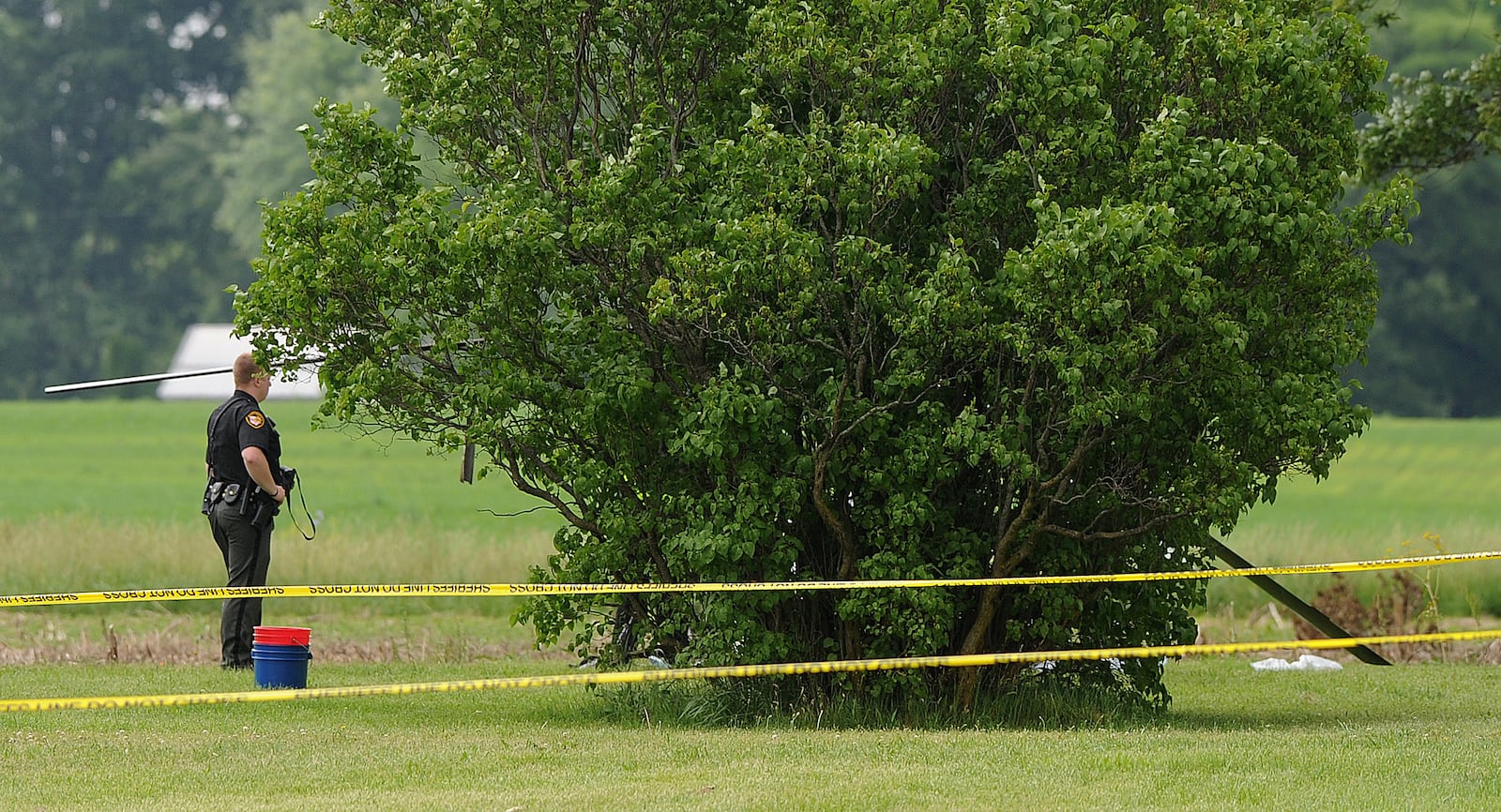 Crews responded to a fiery and deadly helicopter crash Tuesday, June 7, 2022, on Hogspath Road in Neave Twp. near Greenville in Darke County. MARSHALL GORBY\STAFF