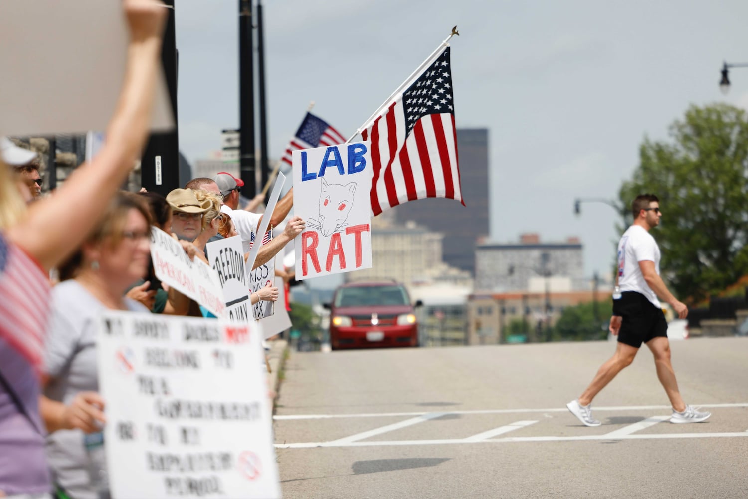 PHOTOS: COVID vaccine protest at area hospitals