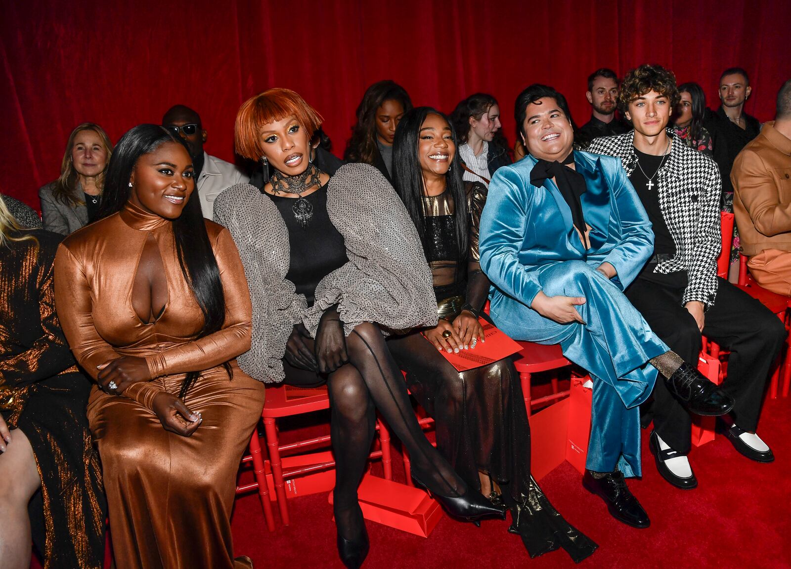 Danielle Brooks, from left, Laverne Cox, Tiffany Haddish, Harvey Guillen and Gavin Casalegno attend the Christian Siriano Fall/Winter 2025 fashion show at Chelsea Industrial during New York Fashion Week on Thursday, Feb. 6, 2025, in New York. (Photo by Evan Agostini/Invision/AP)