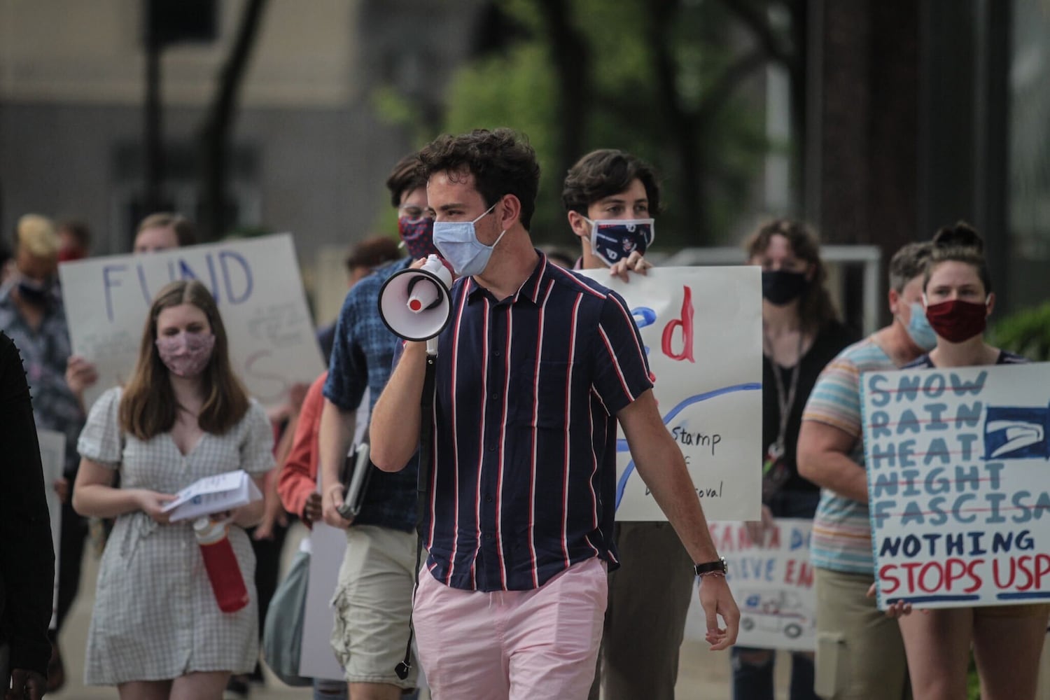 Demonstrators marched for post office