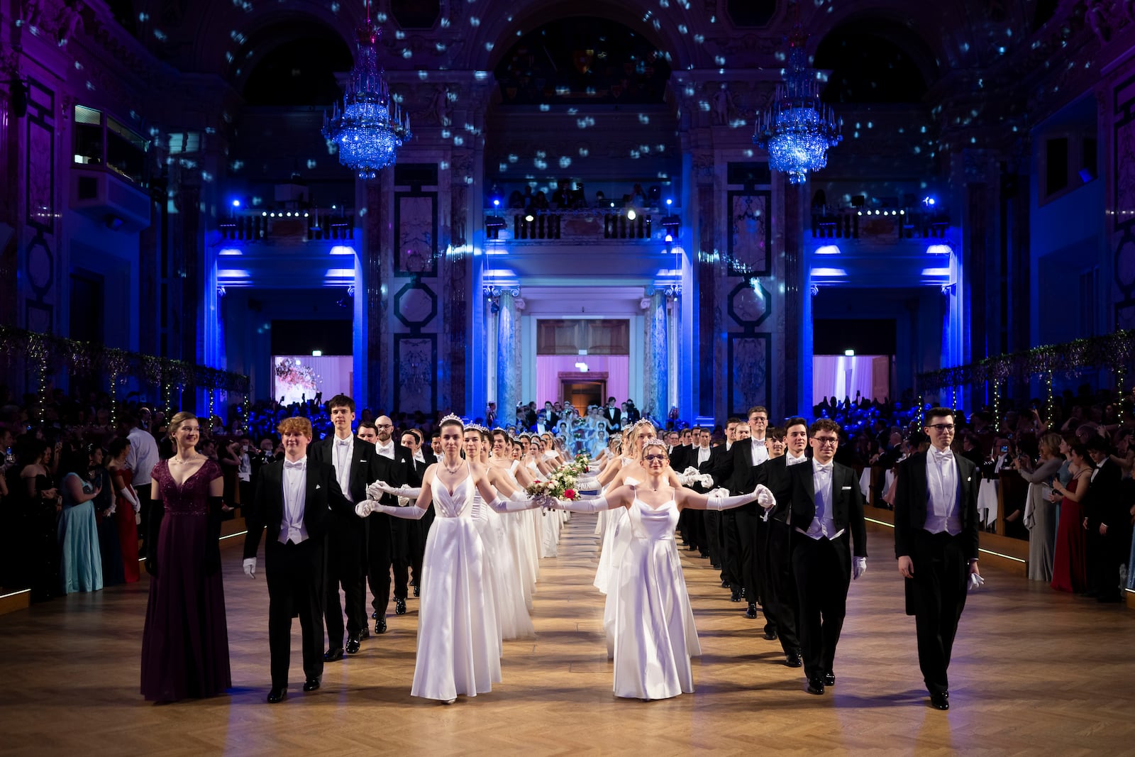 Young people participate in the opening ceremony of the Lawyers' Ball in Vienna, Austria, Saturday, March 1, 2025. (AP Photo/Denes Erdos)